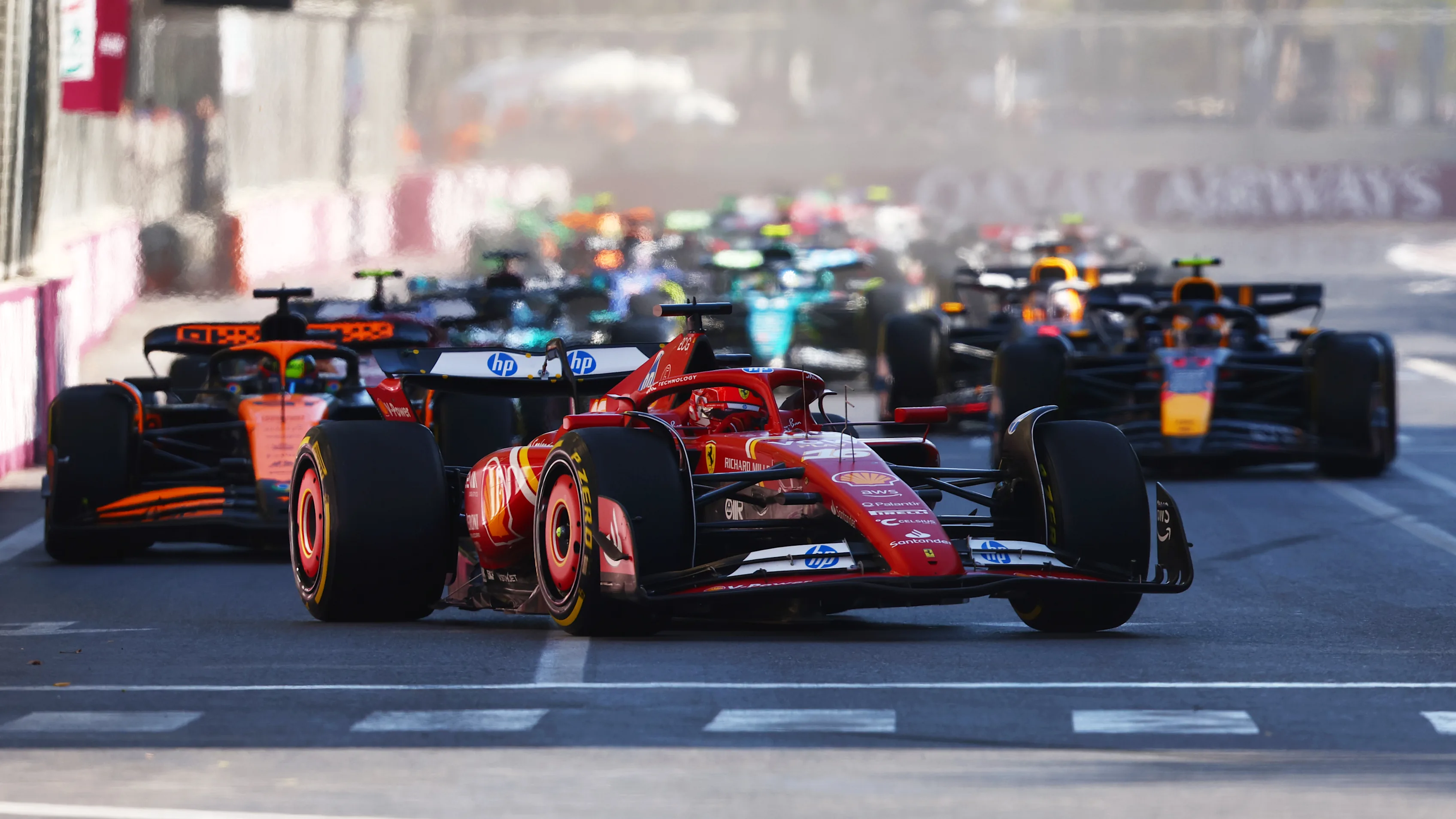BAKU, AZERBAIJAN - SEPTEMBER 15: Charles Leclerc of Monaco driving the (16) Ferrari SF-24 leads the