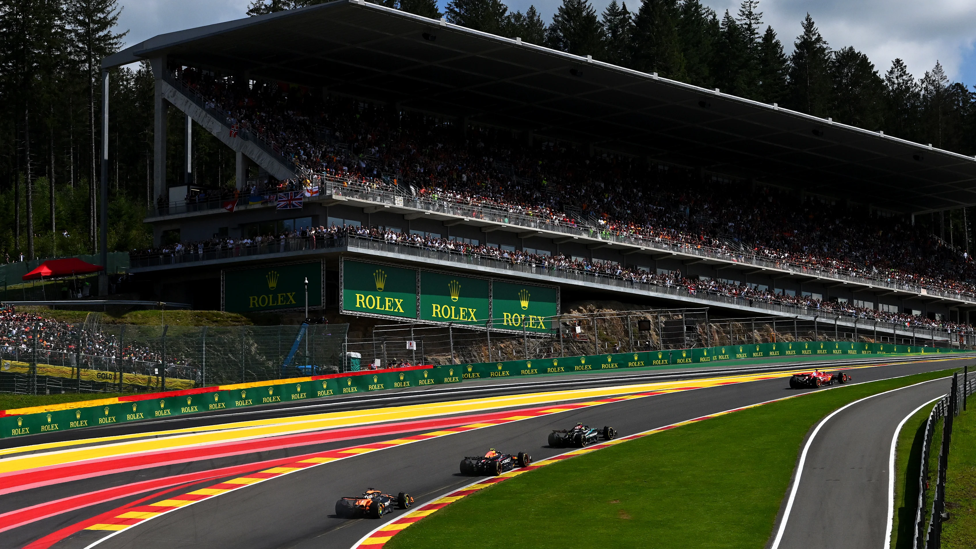 SPA, BELGIUM - JULY 28: Charles Leclerc of Monaco driving the (16) Ferrari SF-24 leads Lewis