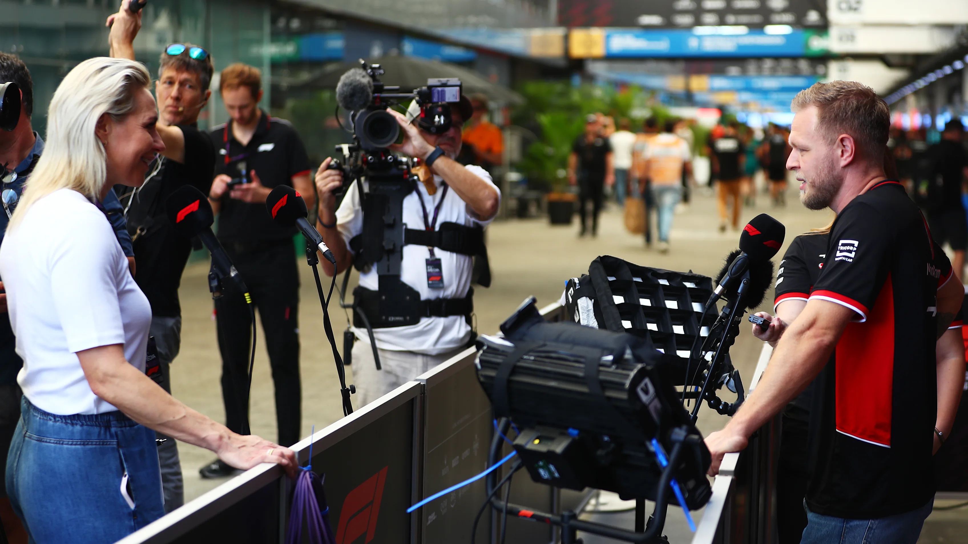 SAO PAULO, BRAZIL - OCTOBER 31: Kevin Magnussen of Denmark and Haas F1 talks to the media in the