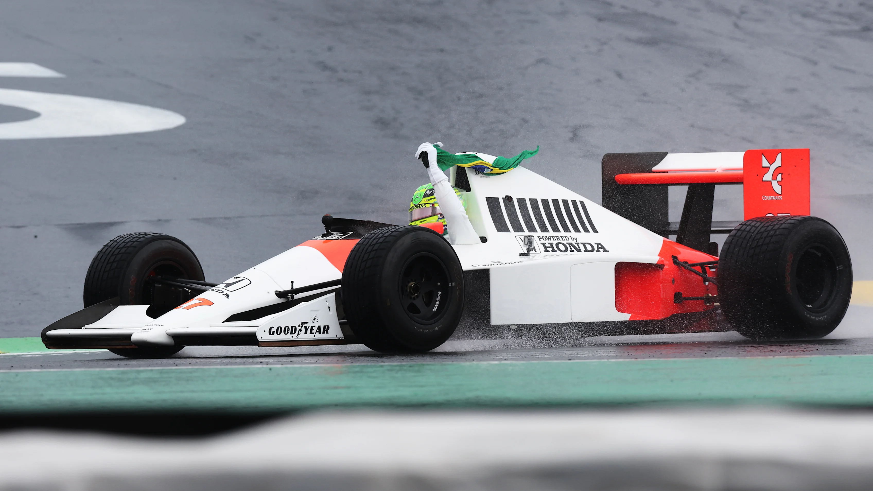 There were emotional scenes as Hamilton flew the Brazilian flag from the cockpit of Senna's 1990 McLaren