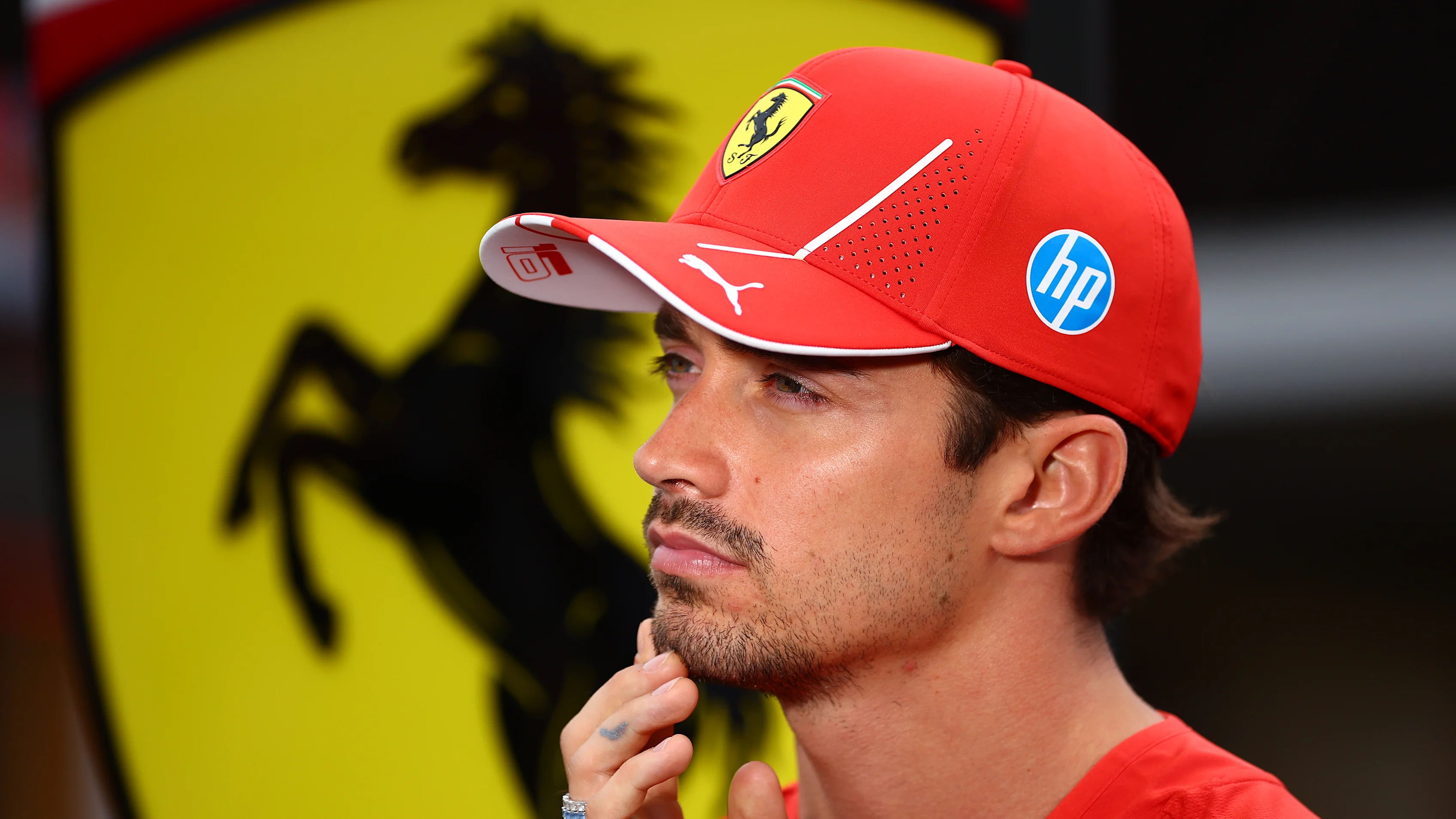 MONTREAL, QUEBEC - JUNE 06: Charles Leclerc of Monaco and Ferrari looks on in the Paddock during