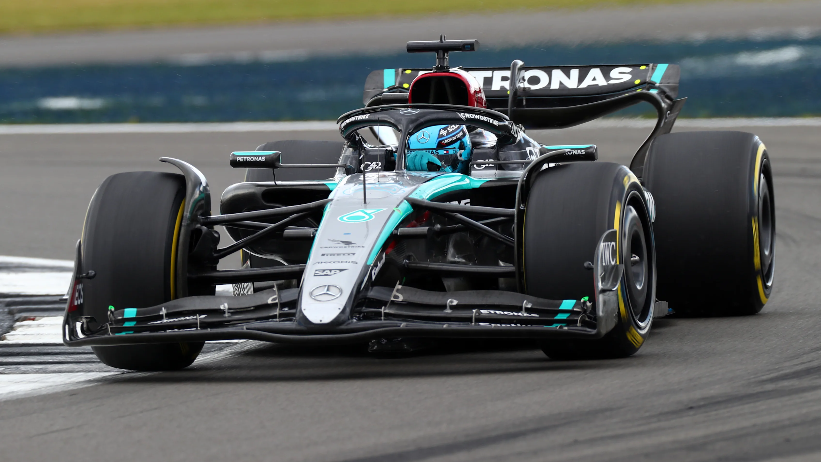 NORTHAMPTON, ENGLAND - JULY 07: George Russell of Great Britain driving the (63) Mercedes AMG