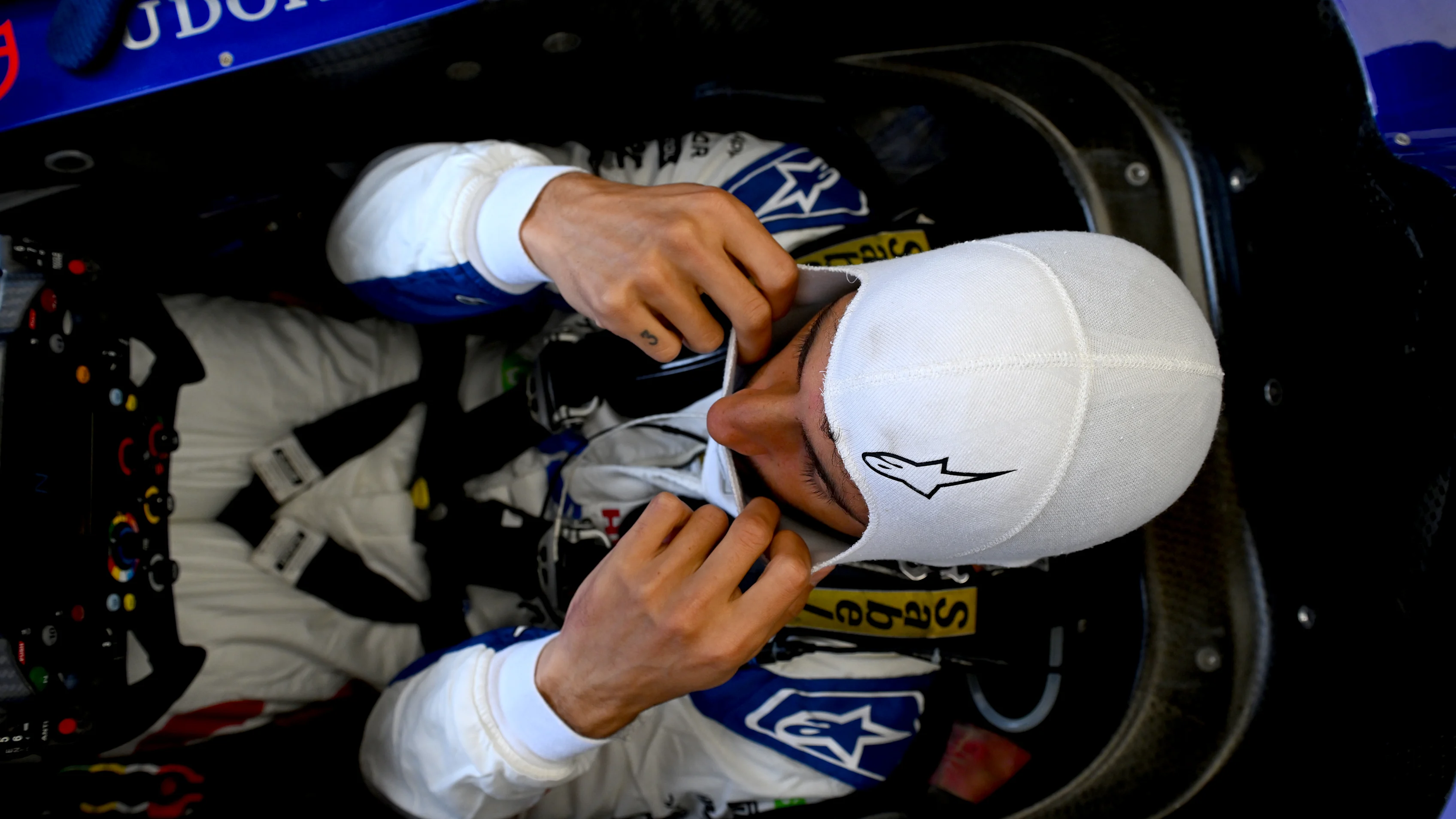 NORTHAMPTON, ENGLAND - JULY 05: Daniel Ricciardo of Australia and Visa Cash App RB prepares to drive in the garage during practice ahead of the F1 Grand Prix of Great Britain at Silverstone Circuit on July 05, 2024 in Northampton, England. (Photo by Rudy Carezzevoli/Getty Images)