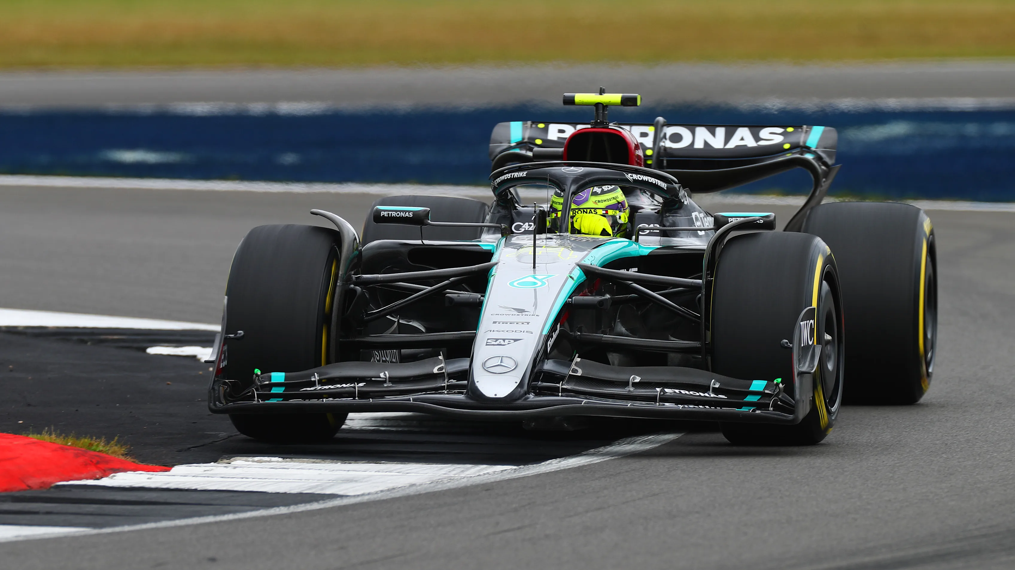 NORTHAMPTON, ENGLAND - JULY 05: Lewis Hamilton of Great Britain driving the (44) Mercedes AMG