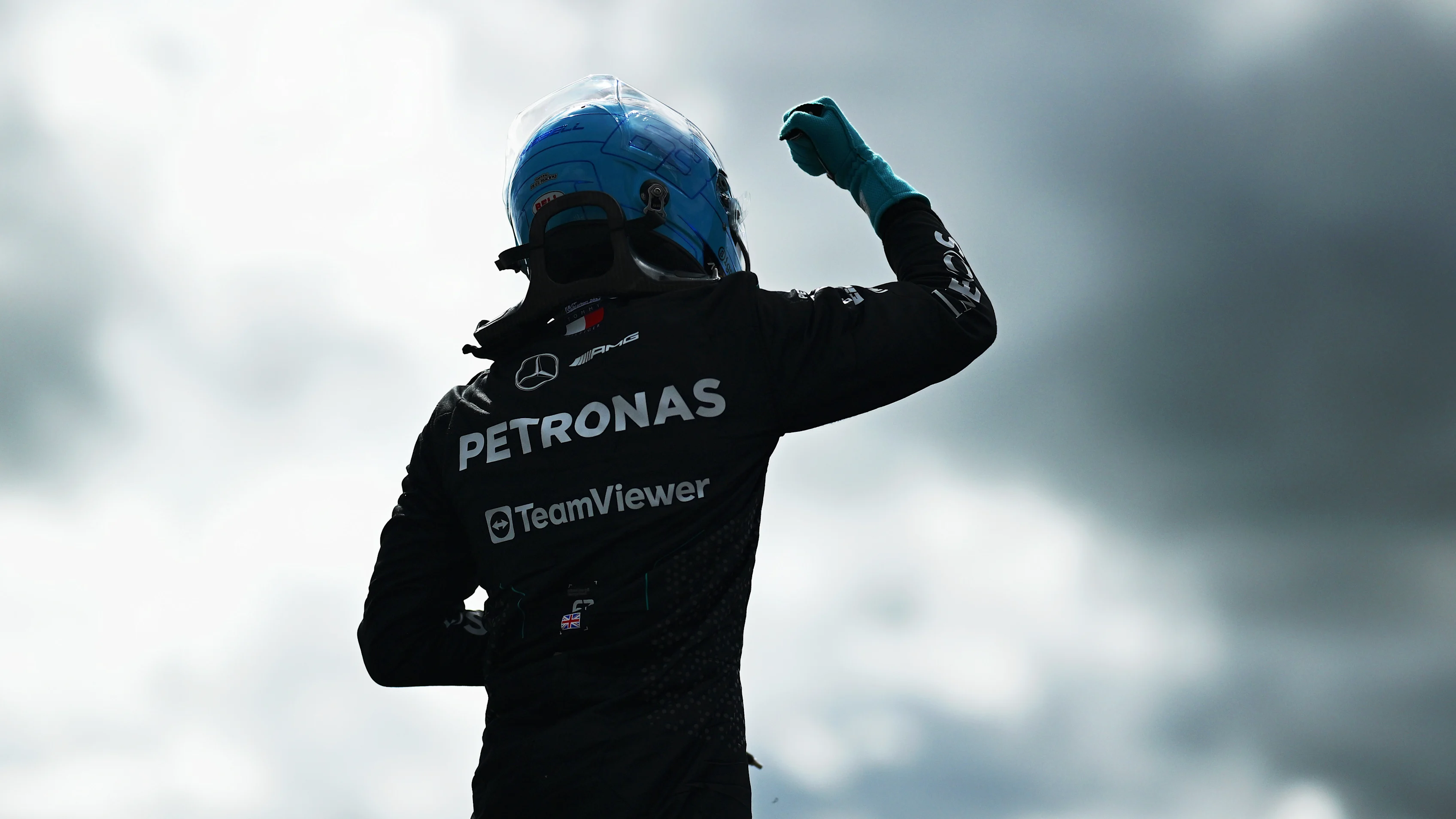 NORTHAMPTON, ENGLAND - JULY 06: Pole position qualifier George Russell of Great Britain and Mercedes celebrates in parc ferme during qualifying ahead of the F1 Grand Prix of Great Britain at Silverstone Circuit on July 06, 2024 in Northampton, England. (Photo by Mario Renzi - Formula 1/Formula 1 via Getty Images)