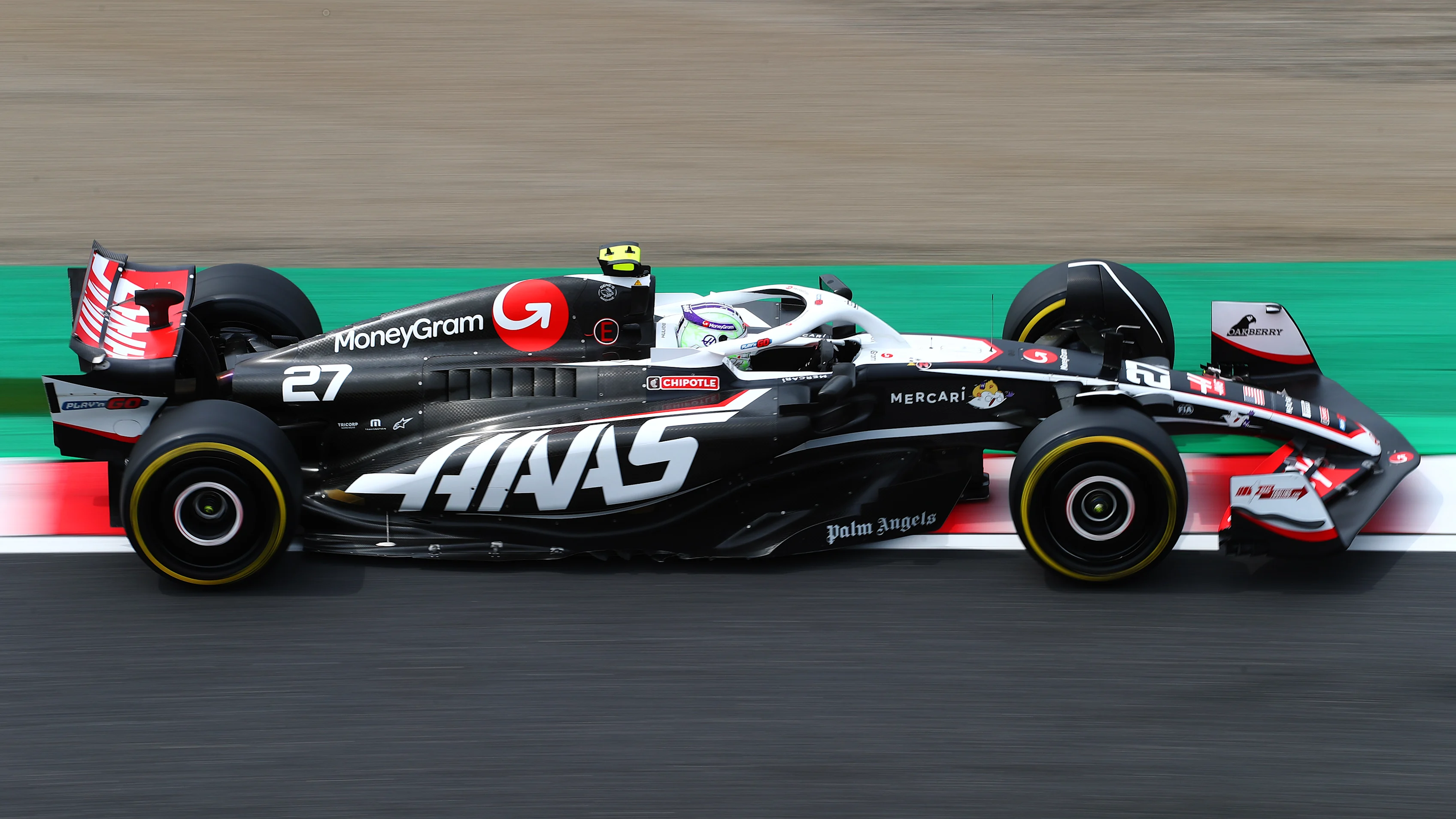 SUZUKA, JAPAN - APRIL 06: Nico Hulkenberg of Germany driving the (27) Haas F1 VF-24 Ferrari on