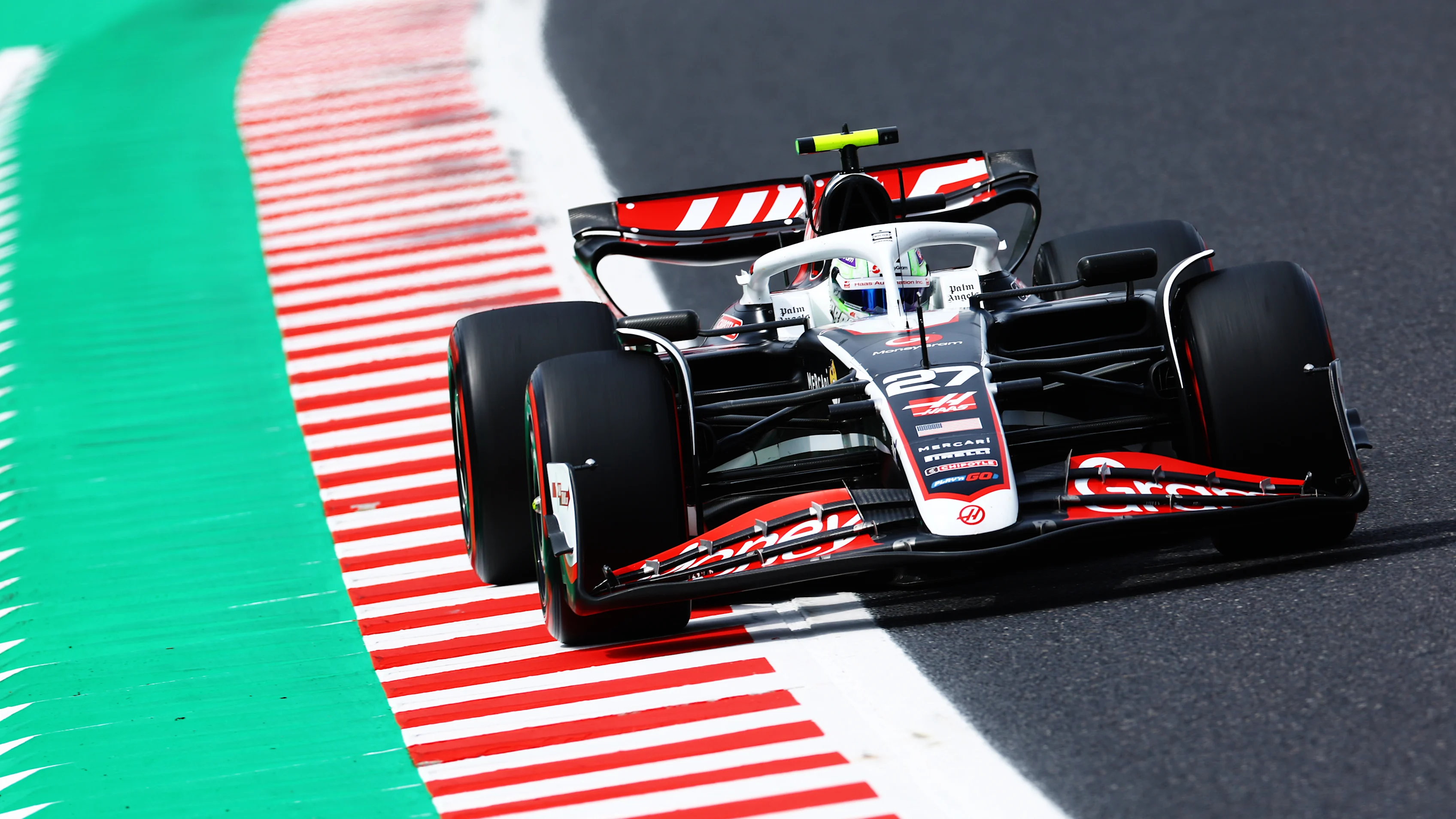 SUZUKA, JAPAN - APRIL 06: Nico Hulkenberg of Germany driving the (27) Haas F1 VF-24 Ferrari on