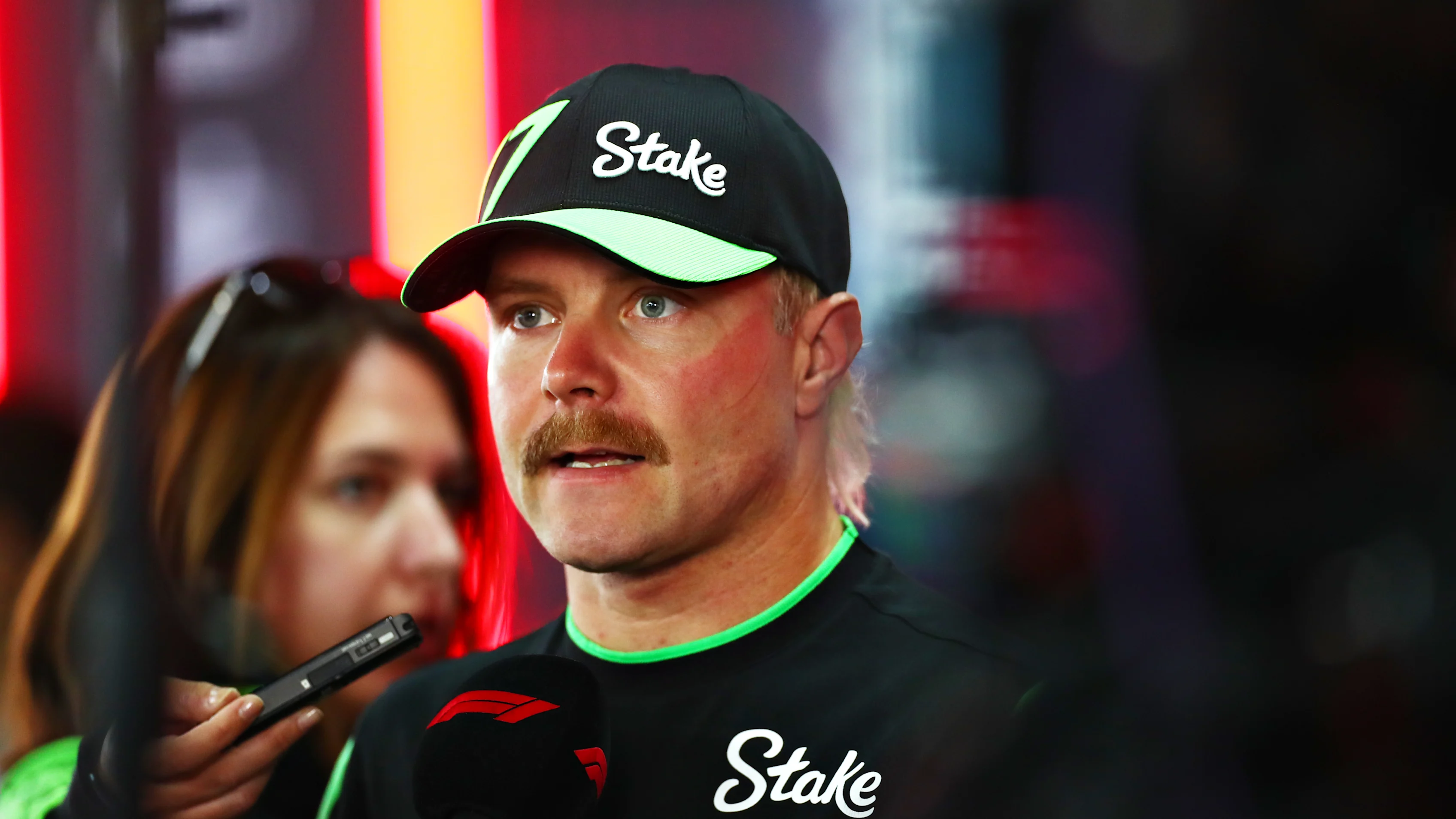 MEXICO CITY, MEXICO - OCTOBER 25: Valtteri Bottas of Finland and Stake F1 Team Kick Sauber talks to