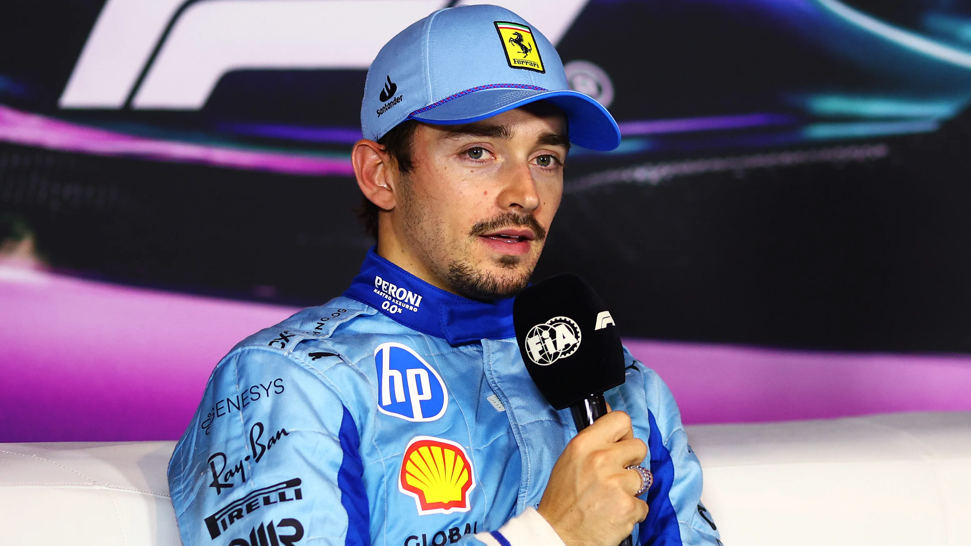 MIAMI, FLORIDA - MAY 04: Second placed qualifier Charles Leclerc of Monaco and Ferrari attends the