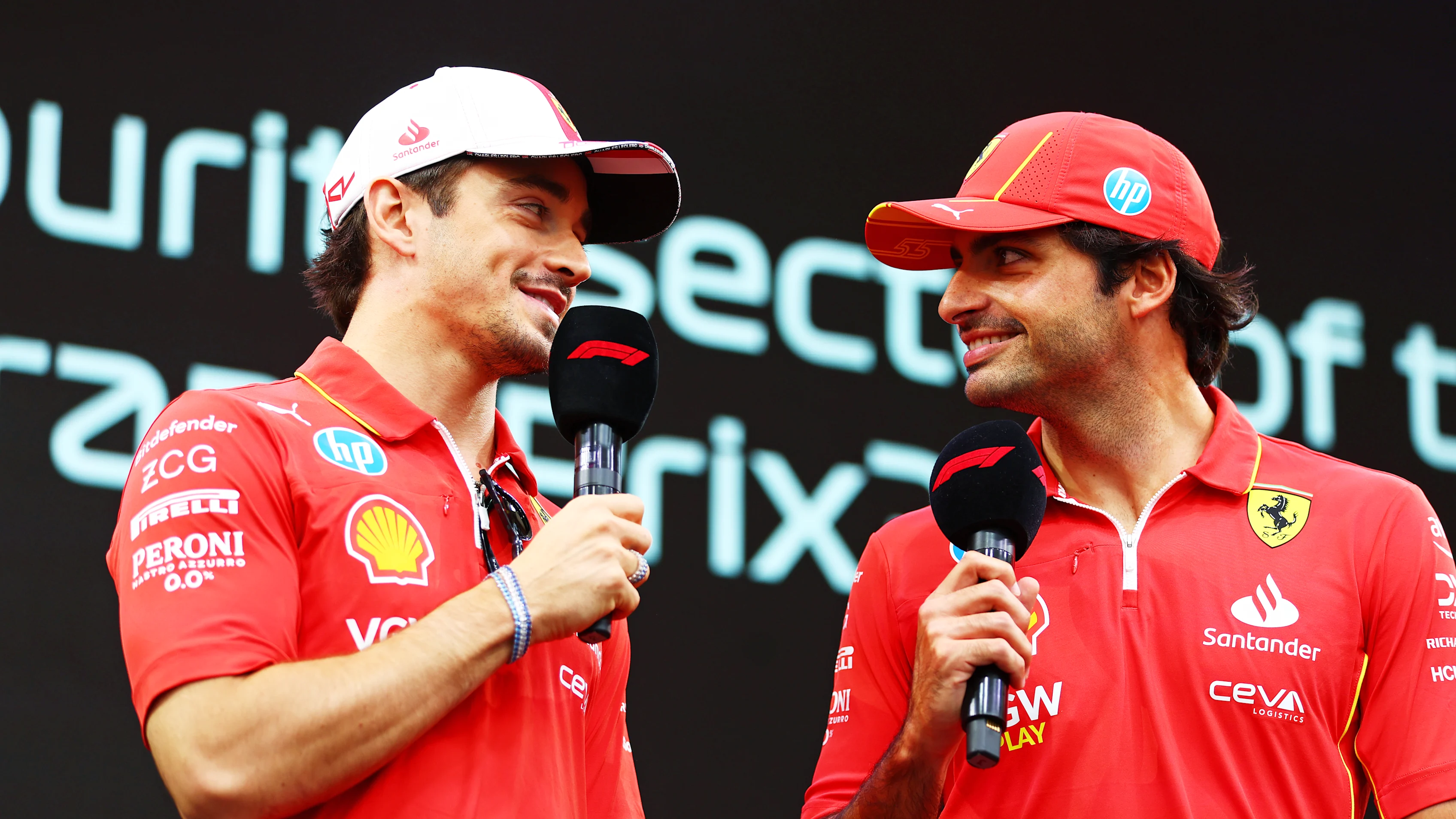 MONTE-CARLO, MONACO - MAY 25: Charles Leclerc of Monaco and Ferrari and Carlos Sainz of Spain and