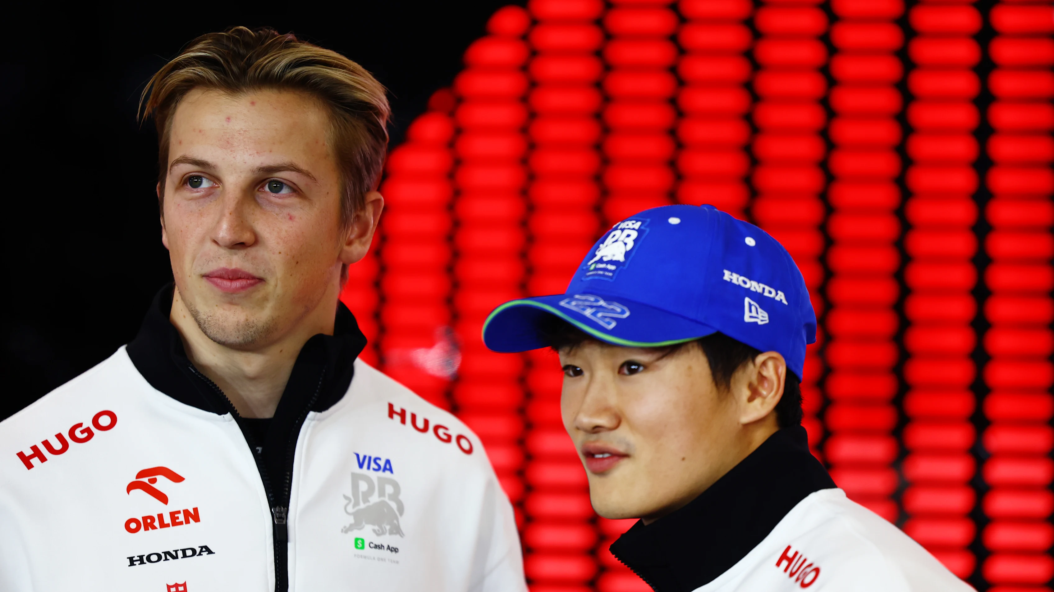 LUSAIL CITY, QATAR - DECEMBER 01: Liam Lawson of New Zealand and Visa Cash App RB and Yuki Tsunoda