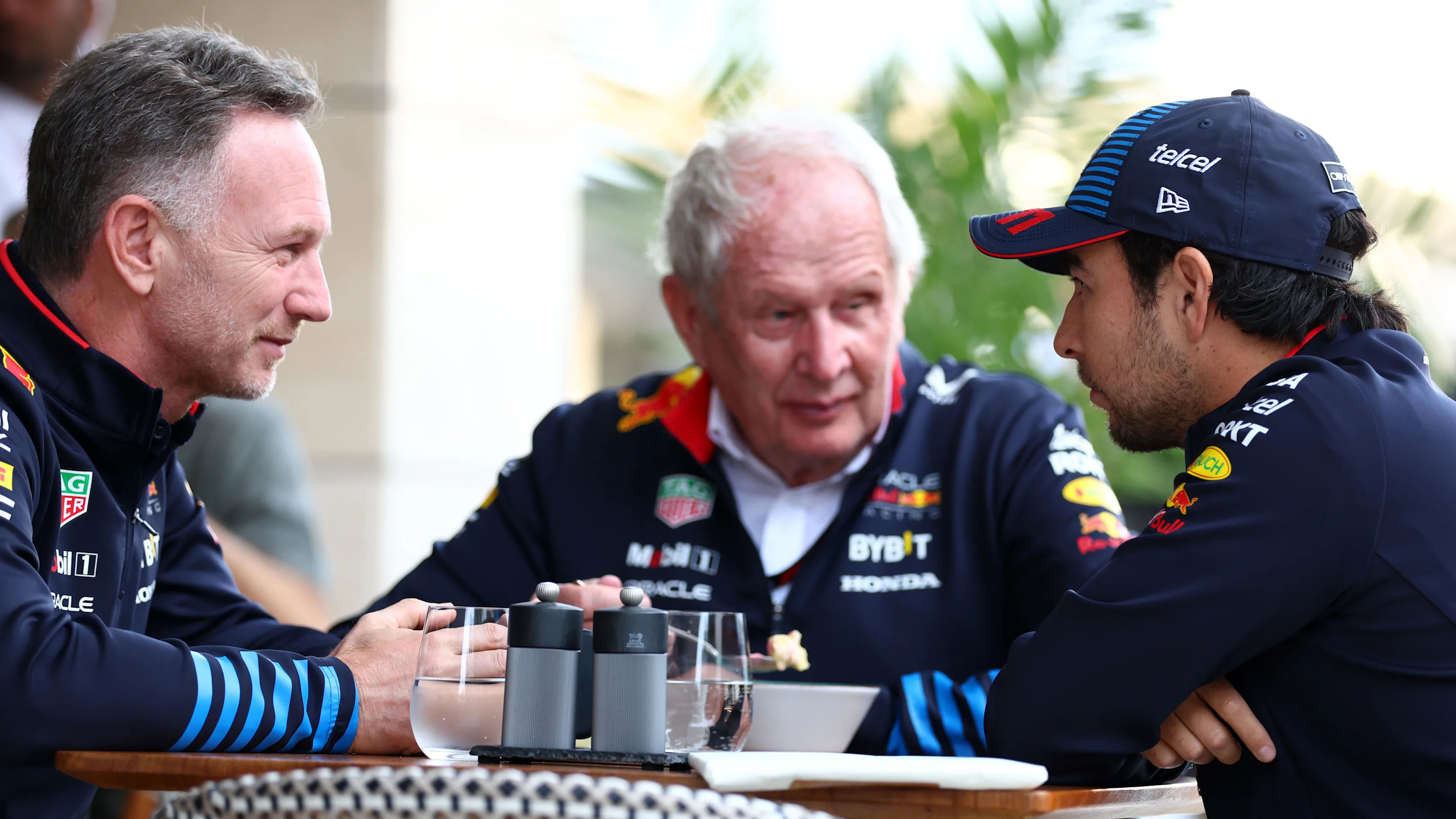 LUSAIL CITY, QATAR - DECEMBER 01: Sergio Perez of Mexico and Oracle Red Bull Racing talks with