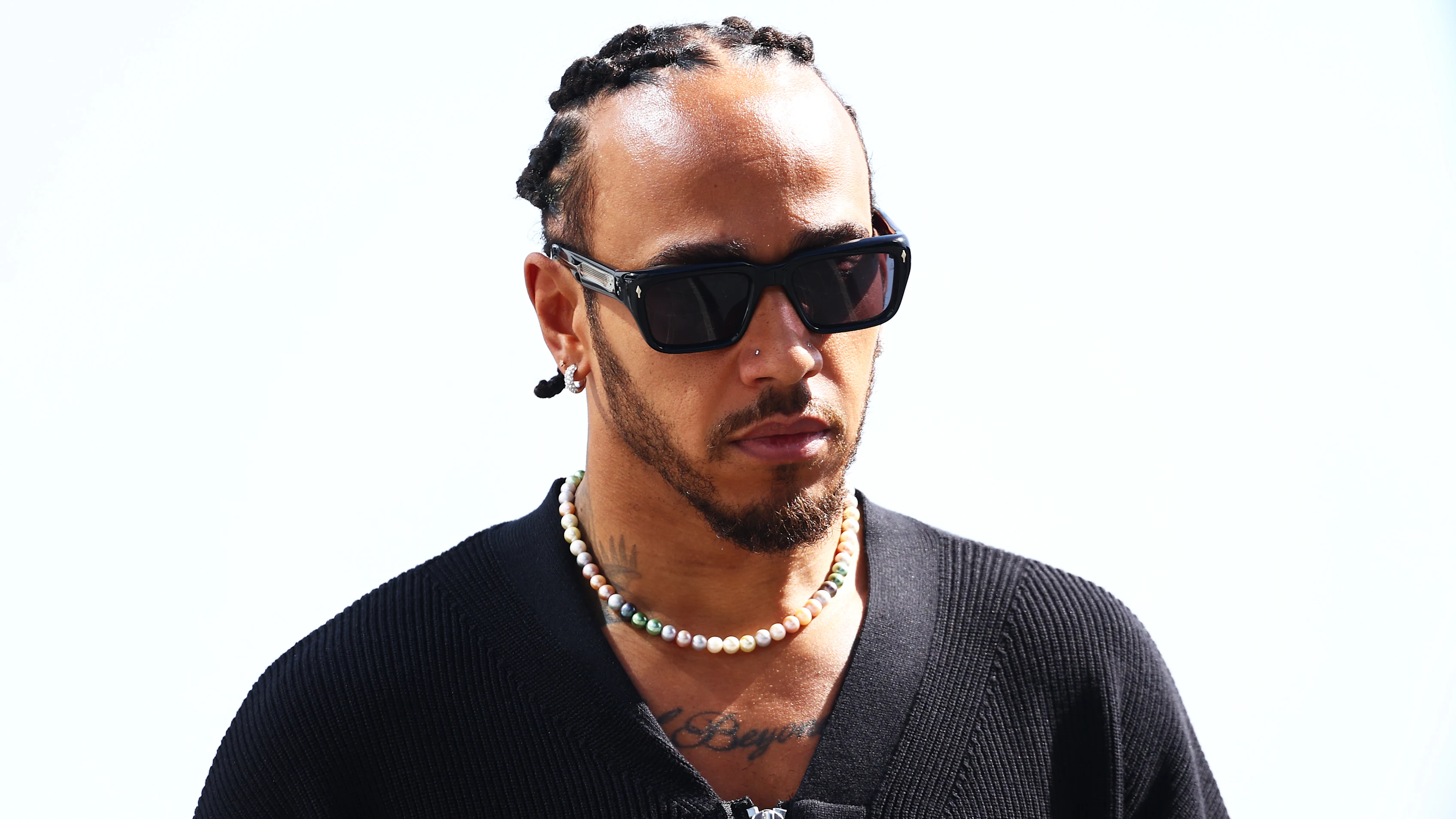 JEDDAH, SAUDI ARABIA - MARCH 07: Lewis Hamilton of Great Britain and Mercedes walks in the Paddock