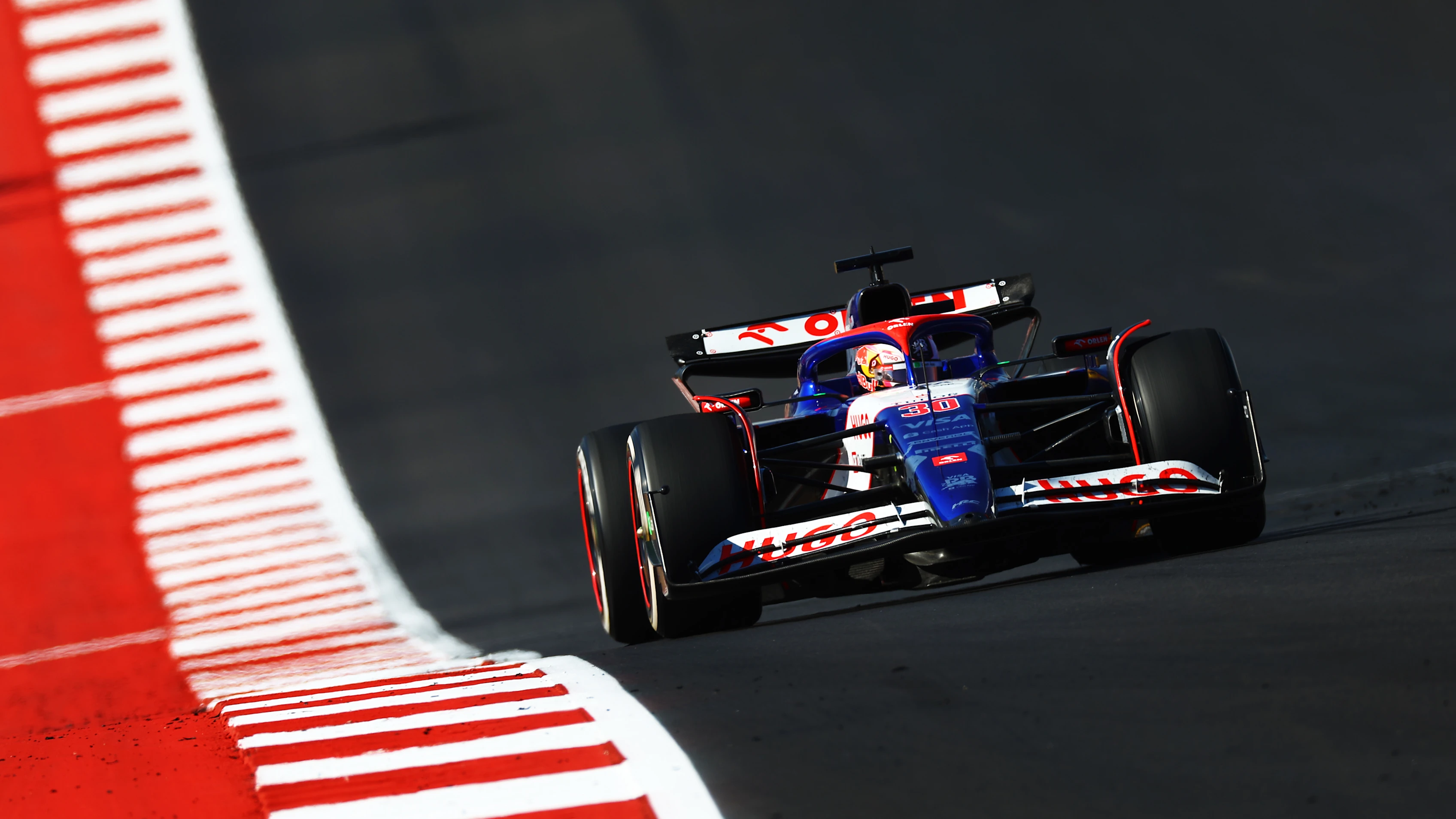 AUSTIN, TEXAS - OCTOBER 20: Liam Lawson of New Zealand driving the (40) Visa Cash App RB VCARB 01