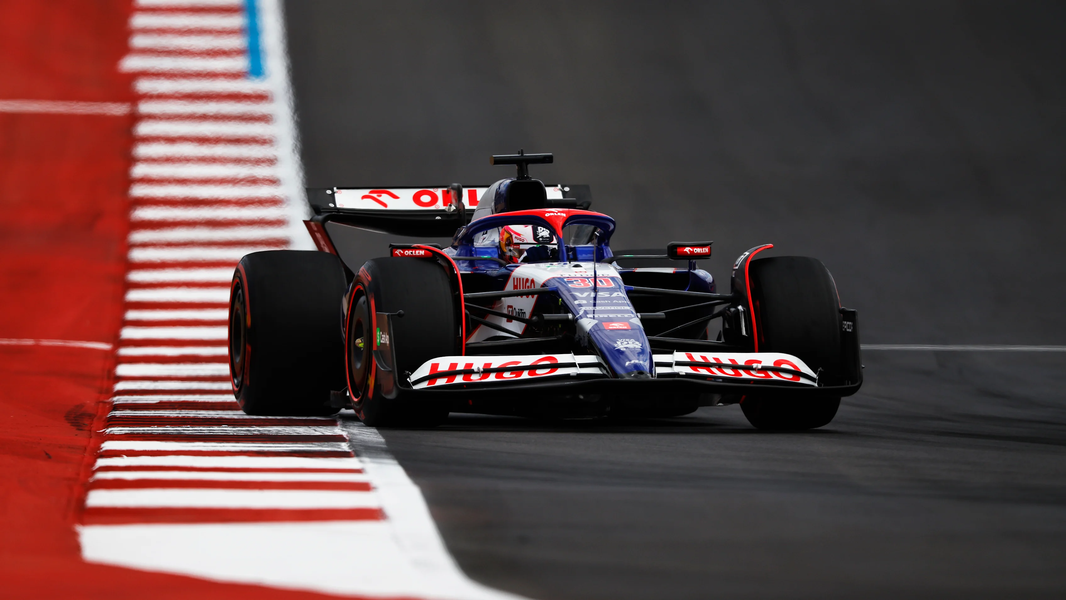 AUSTIN, TEXAS - OCTOBER 18: Liam Lawson of New Zealand driving the (30) Visa Cash App RB VCARB 01