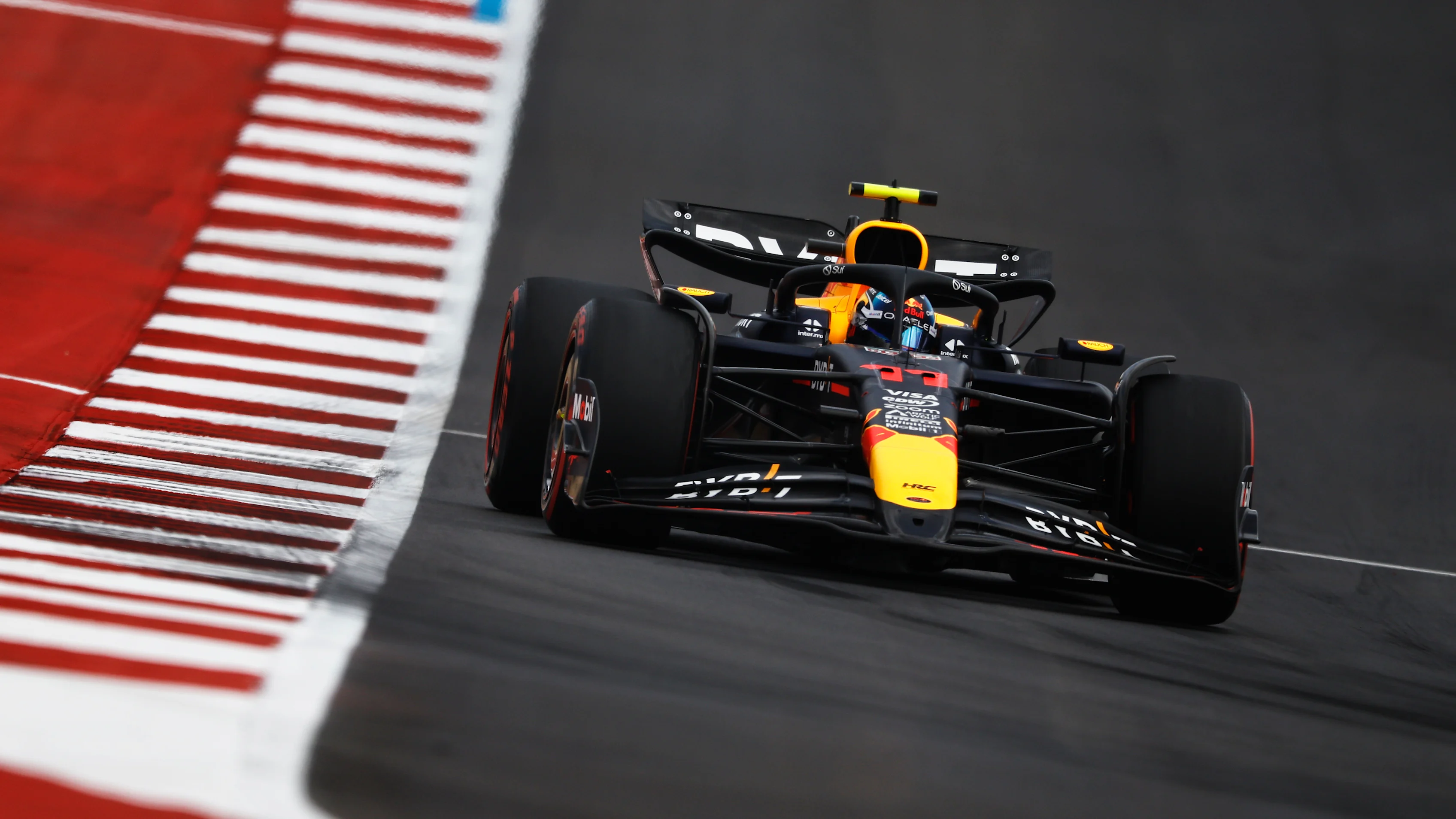 AUSTIN, TEXAS - OCTOBER 18: Sergio Perez of Mexico driving the (11) Oracle Red Bull Racing RB20 on
