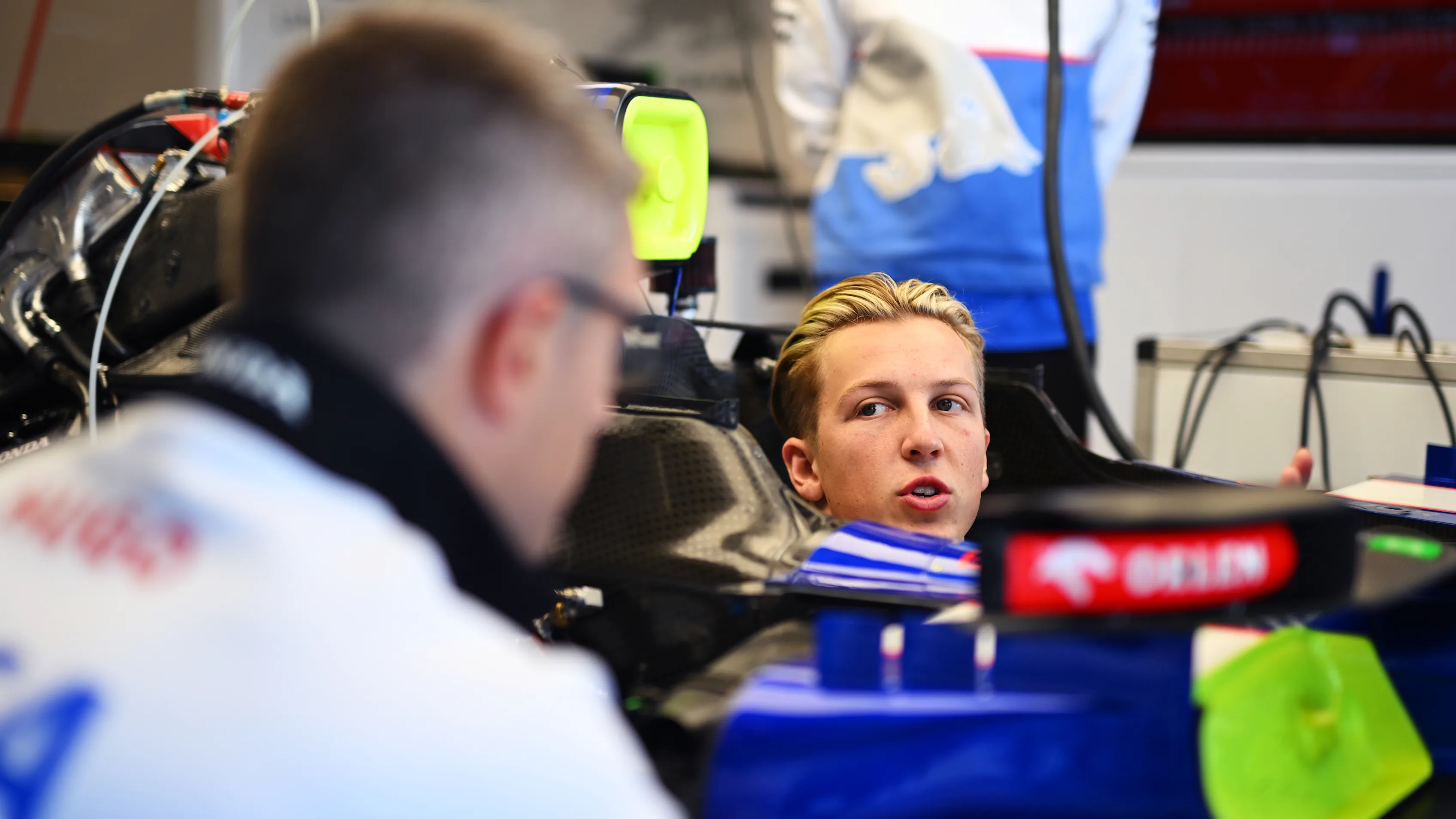 AUSTIN, TEXAS - OCTOBER 17: Liam Lawson of New Zealand and Visa Cash App RB has a seat fitting in