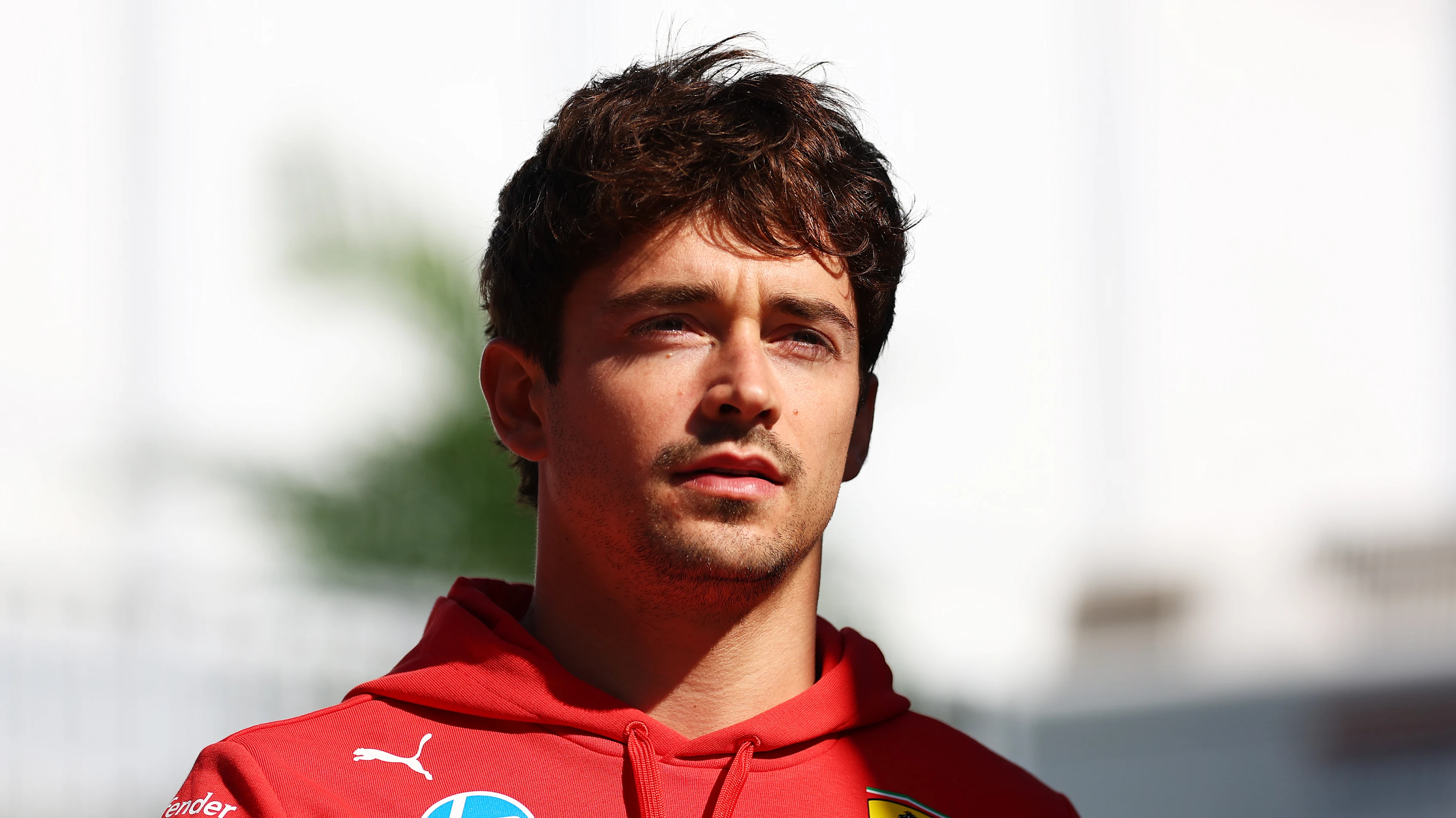 AUSTIN, TEXAS - OCTOBER 17: Charles Leclerc of Monaco and Ferrari looks on in the Paddock during