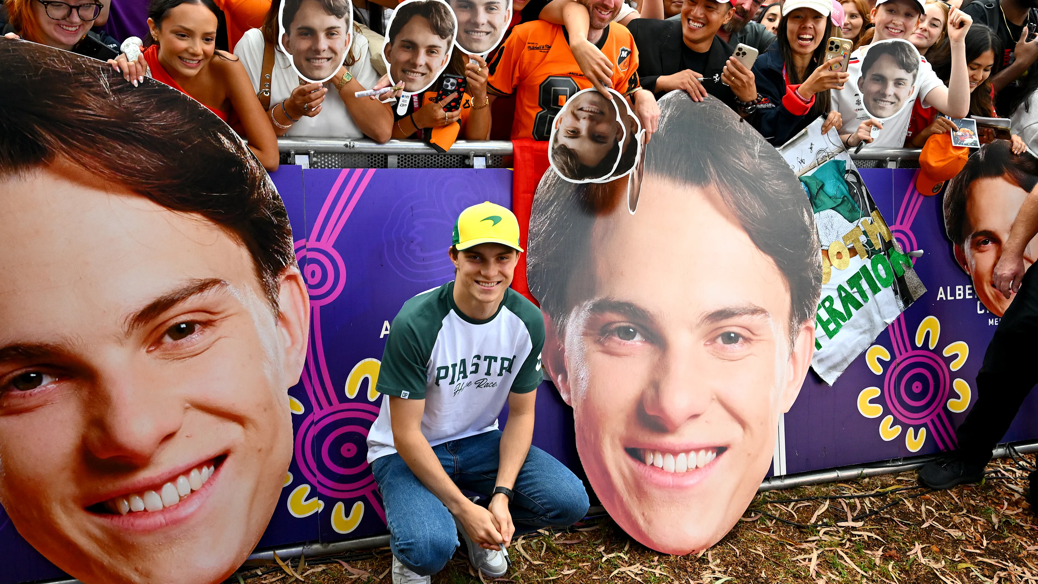 MELBOURNE, AUSTRALIA - MARCH 13: Oscar Piastri of Australia and McLaren with fans during previews