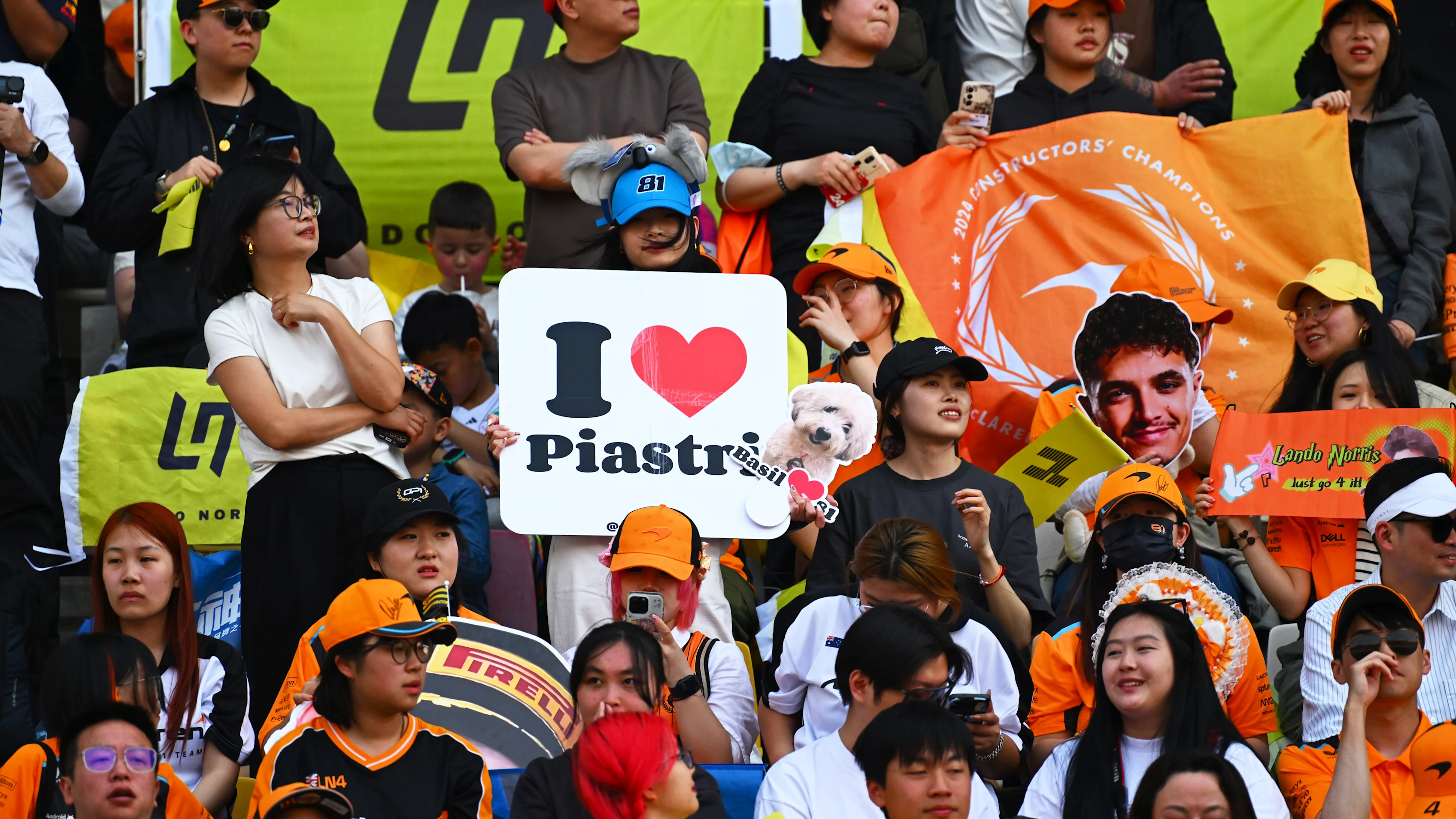 SHANGHAI, CHINA - MARCH 23: Fans of Lando Norris of Great Britain and McLaren and Oscar Piastri of