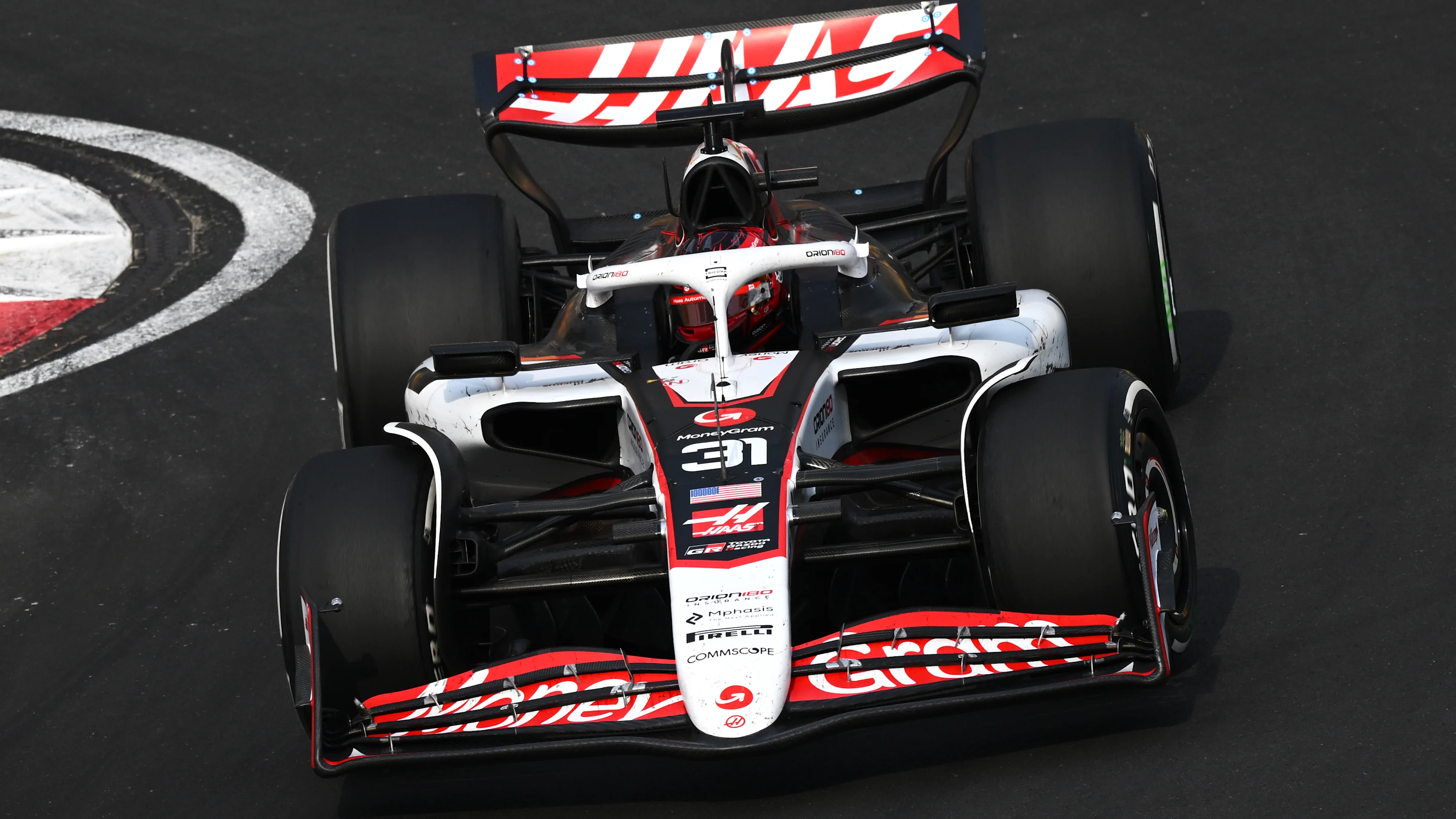 SHANGHAI, CHINA - MARCH 23: Esteban Ocon of France driving the (31) Haas F1 VF-25 Ferrari on track