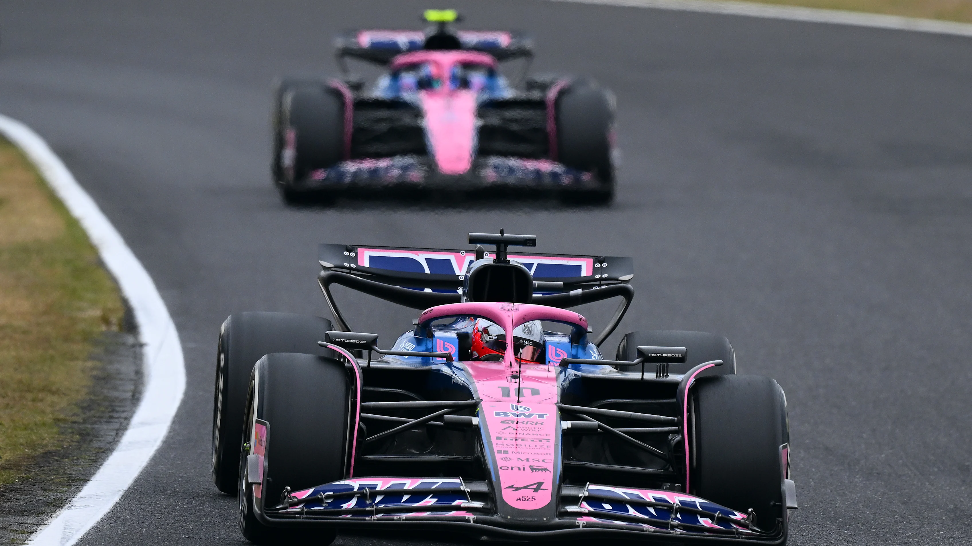 SUZUKA, JAPAN - APRIL 06: Pierre Gasly of France driving the (10) Alpine F1 A525 Renault leads Jack