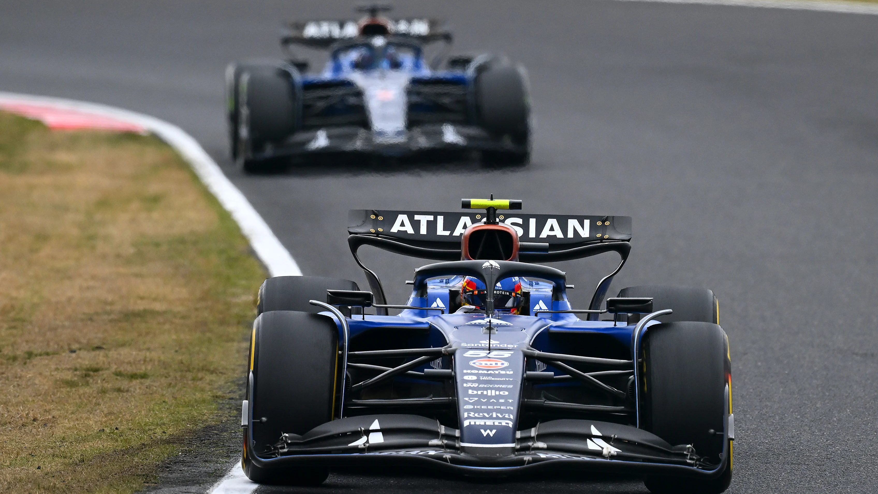 SUZUKA, JAPAN - APRIL 06: Carlos Sainz of Spain driving the (55) Williams FW47 Mercedes leads