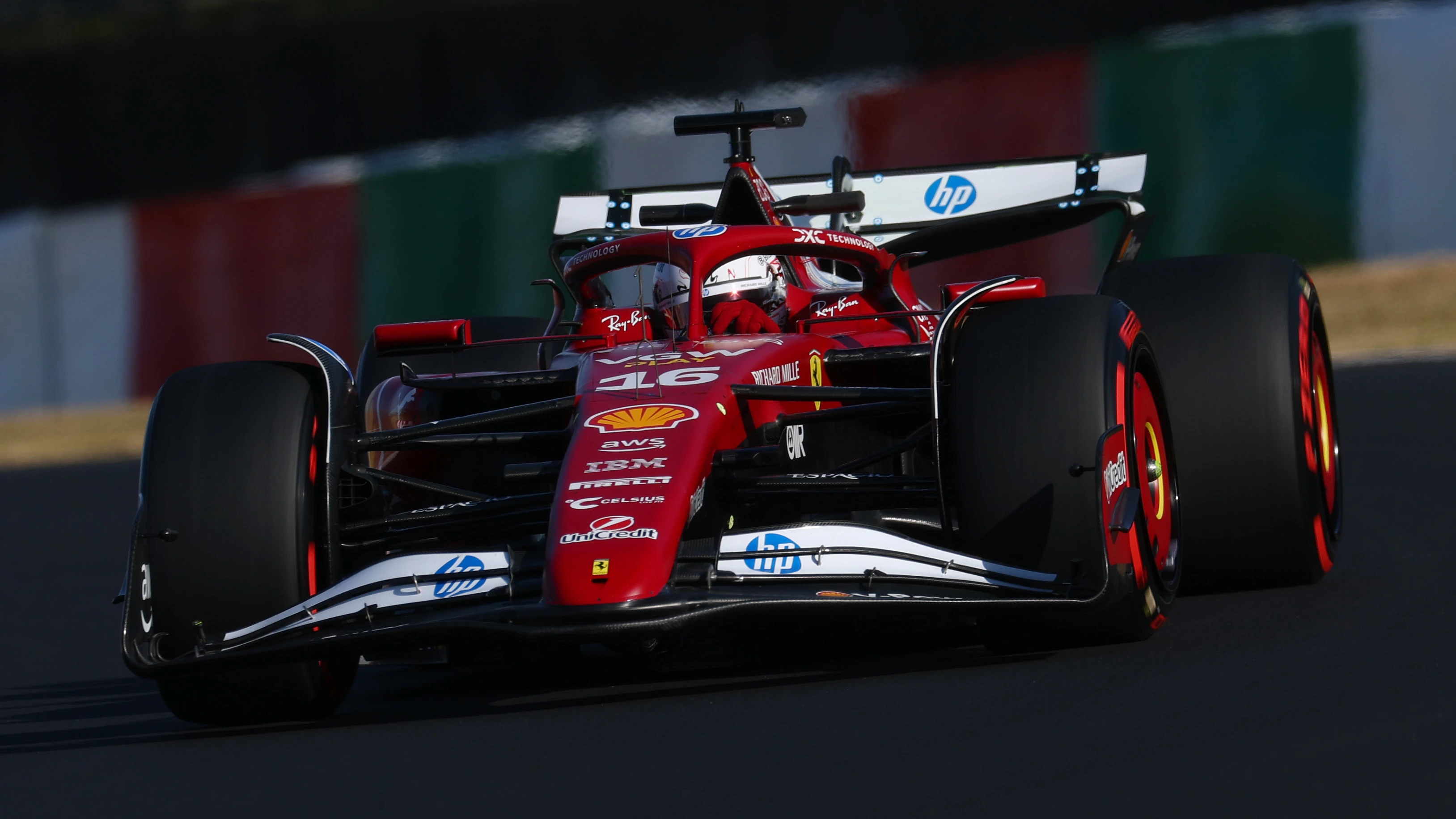 SUZUKA, JAPAN - APRIL 04: Charles Leclerc of Monaco driving the (16) Scuderia Ferrari SF-25 on
