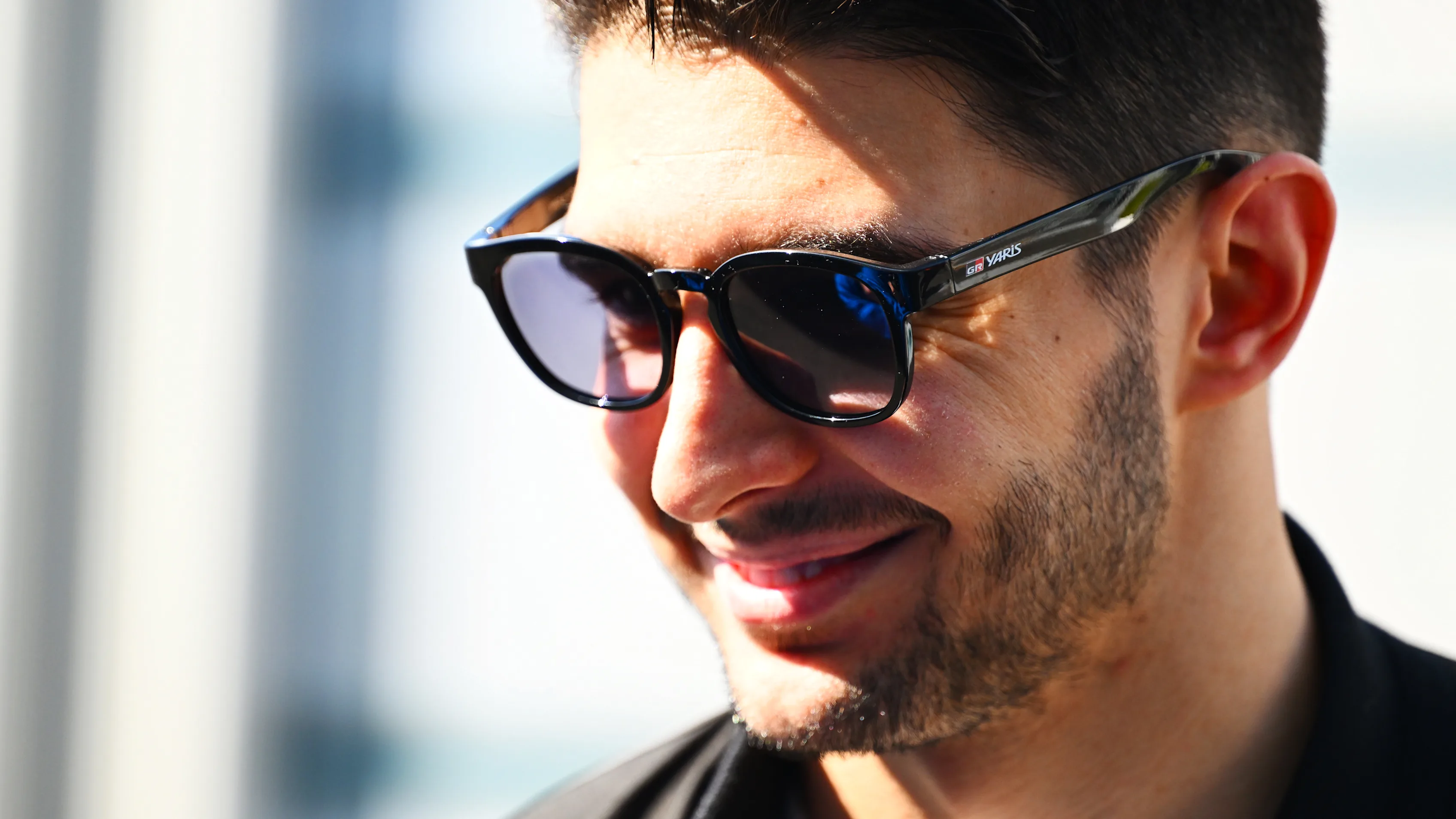 SUZUKA, JAPAN - APRIL 03: Esteban Ocon of France and Haas F1 looks on in the Paddock during