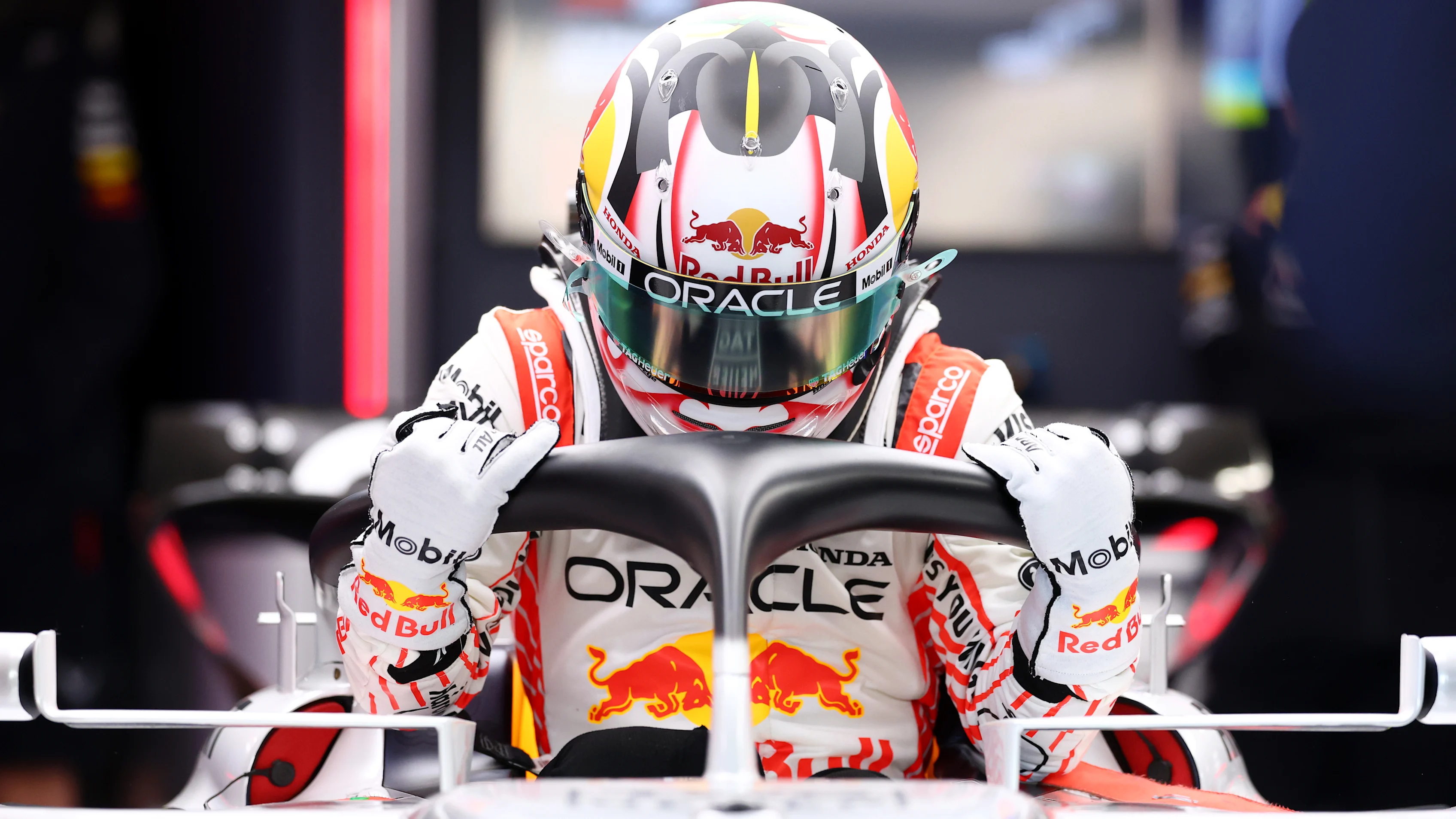 SUZUKA, JAPAN - APRIL 03: Yuki Tsunoda of Japan and Oracle Red Bull Racing has a seat fit in the