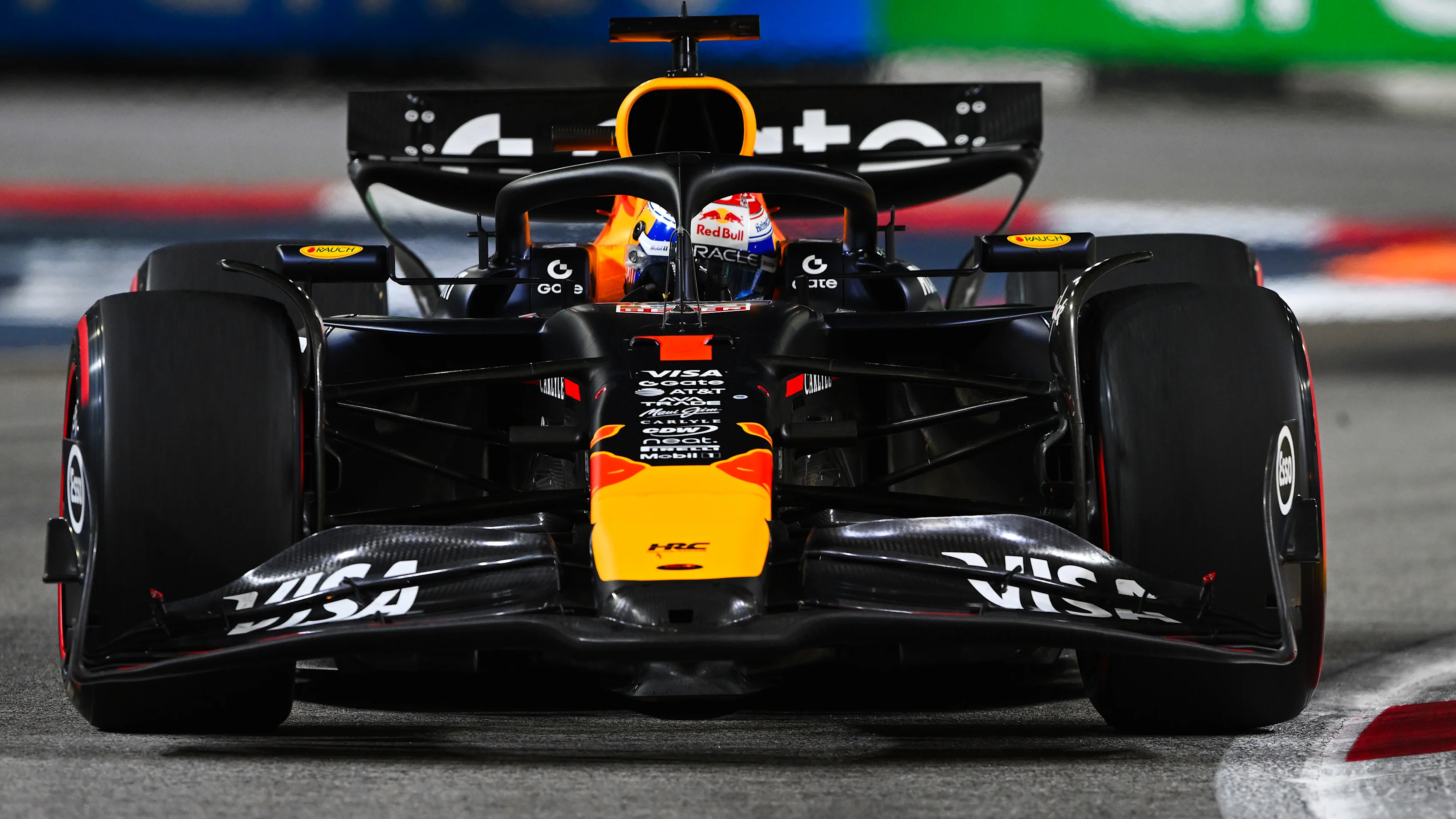 SINGAPORE, SINGAPORE - OCTOBER 05: Max Verstappen of the Netherlands driving the (1) Oracle Red