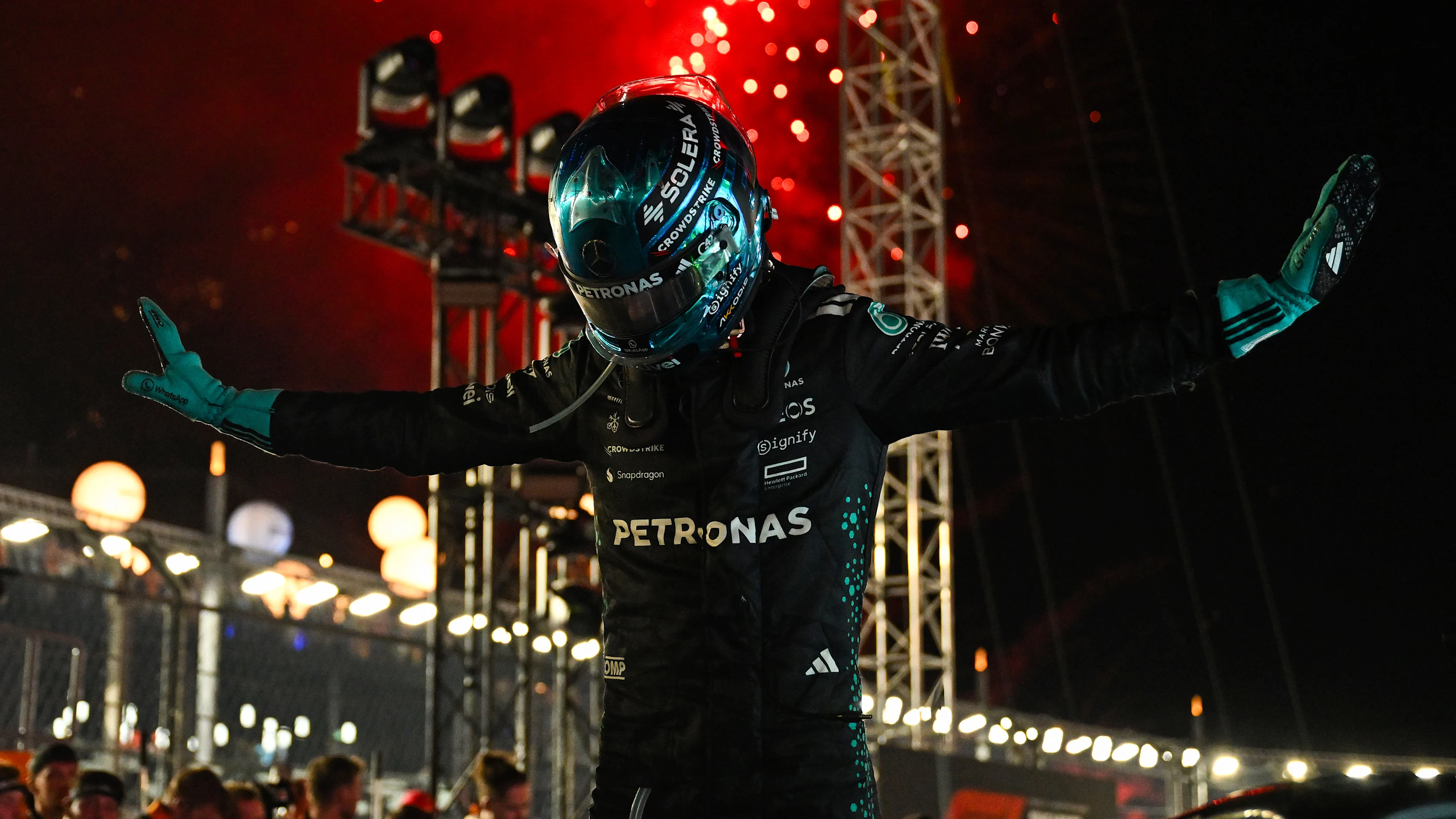 SINGAPORE, SINGAPORE - OCTOBER 05: Race winner George Russell of Great Britain and Mercedes AMG