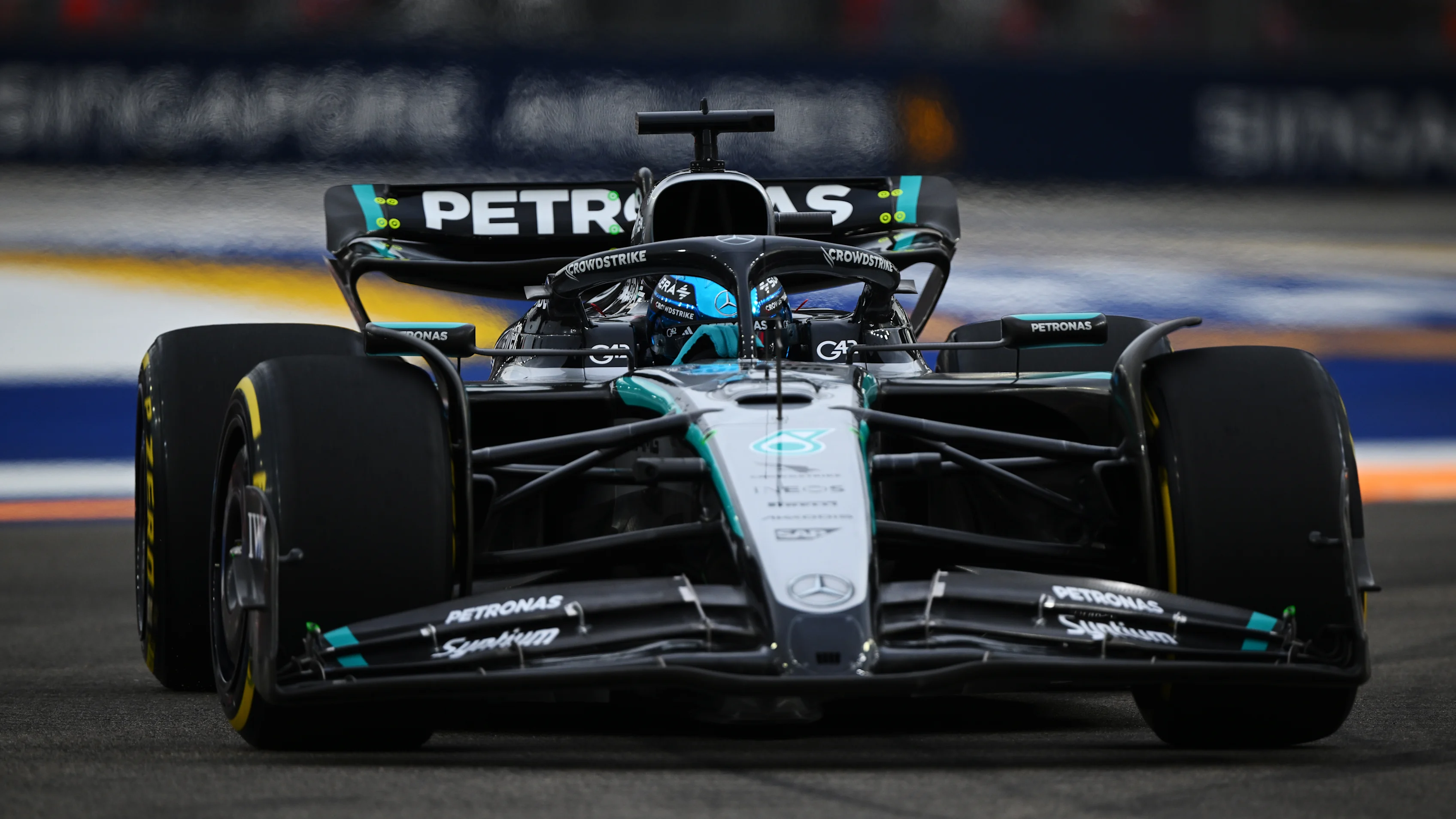 SINGAPORE, SINGAPORE - OCTOBER 03: George Russell of Great Britain driving the (63) Mercedes AMG
