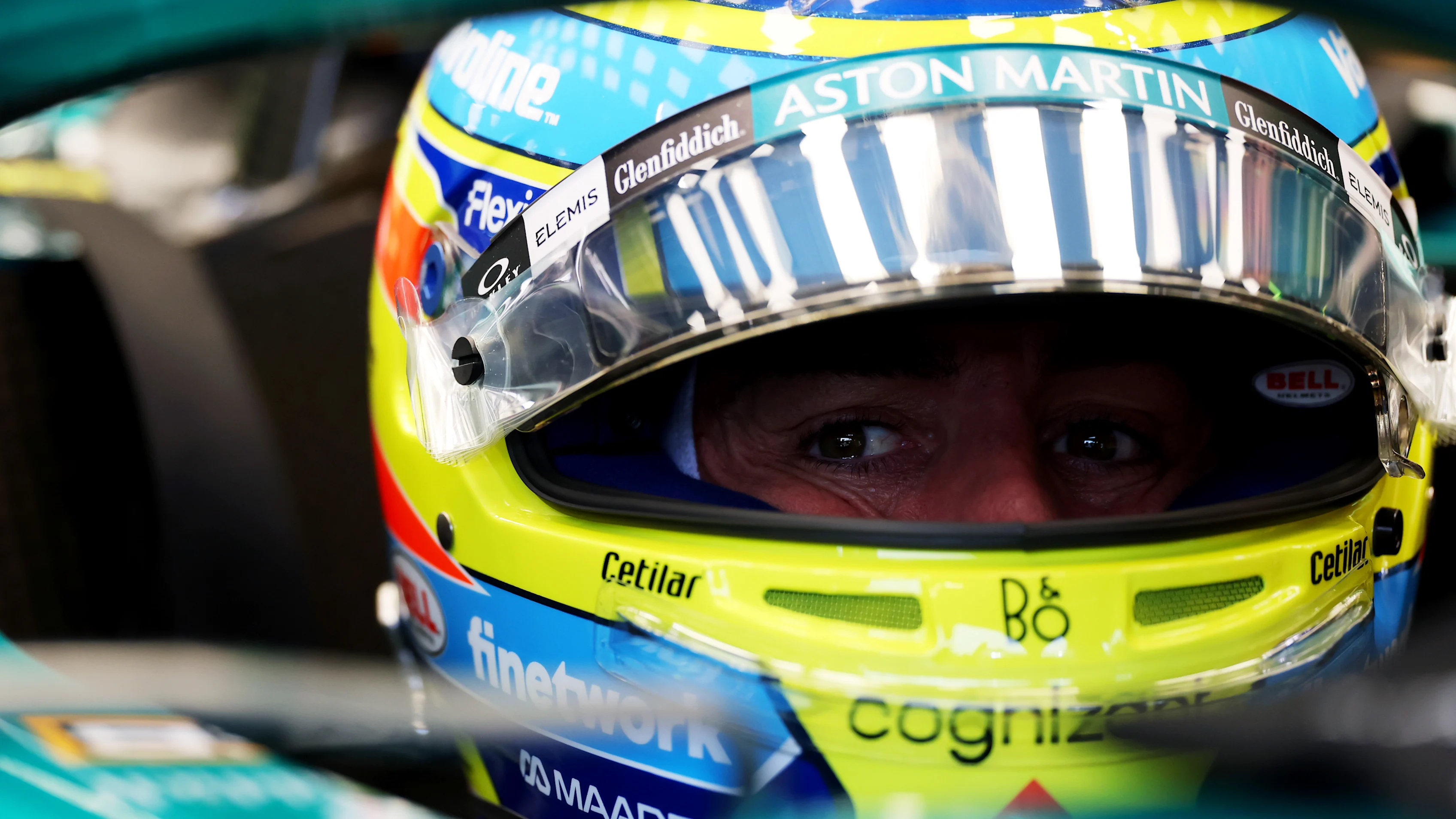 SINGAPORE, SINGAPORE - OCTOBER 04: Fernando Alonso of Spain and Aston Martin F1 Team prepares to drive in the garage prior to final practice ahead of the F1 Grand Prix of Singapore at Marina Bay Street Circuit on October 04, 2025 in Singapore, Singapore. (Photo by Clive Rose - Formula 1/Formula 1 via Getty Images)
