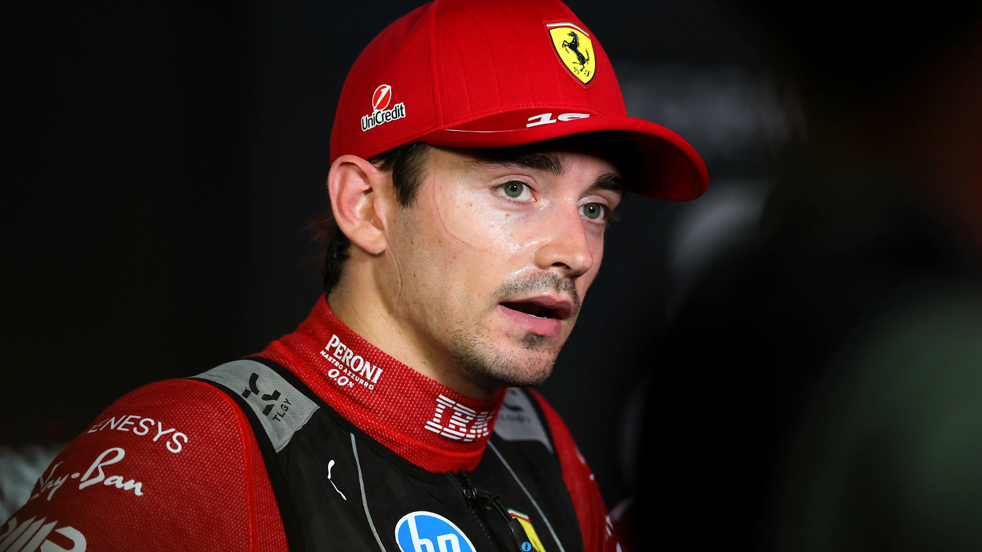 SINGAPORE, SINGAPORE - OCTOBER 04: Seventh placed qualifier Charles Leclerc of Monaco and Scuderia