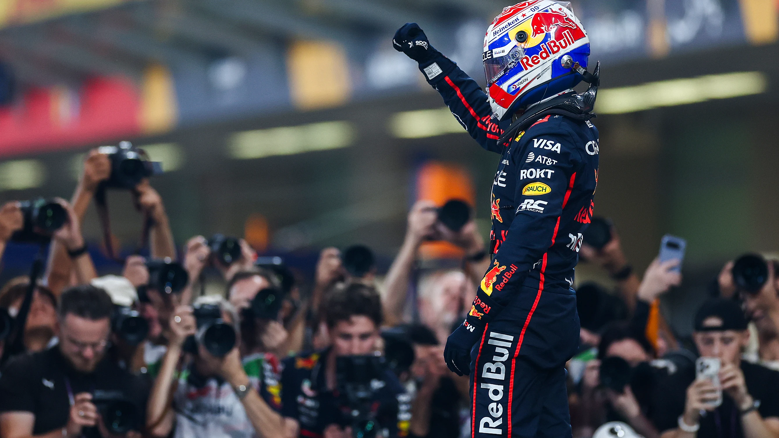 ABU DHABI, UNITED ARAB EMIRATES - DECEMBER 06: Max Verstappen of Oracle Red Bull Racing and The Netherlands celebrates pole position during qualifying ahead of the F1 Grand Prix of Abu Dhabi at Yas Marina Circuit on December 06, 2025 in Abu Dhabi, United Arab Emirates. (Photo by Peter Fox/Getty Images)