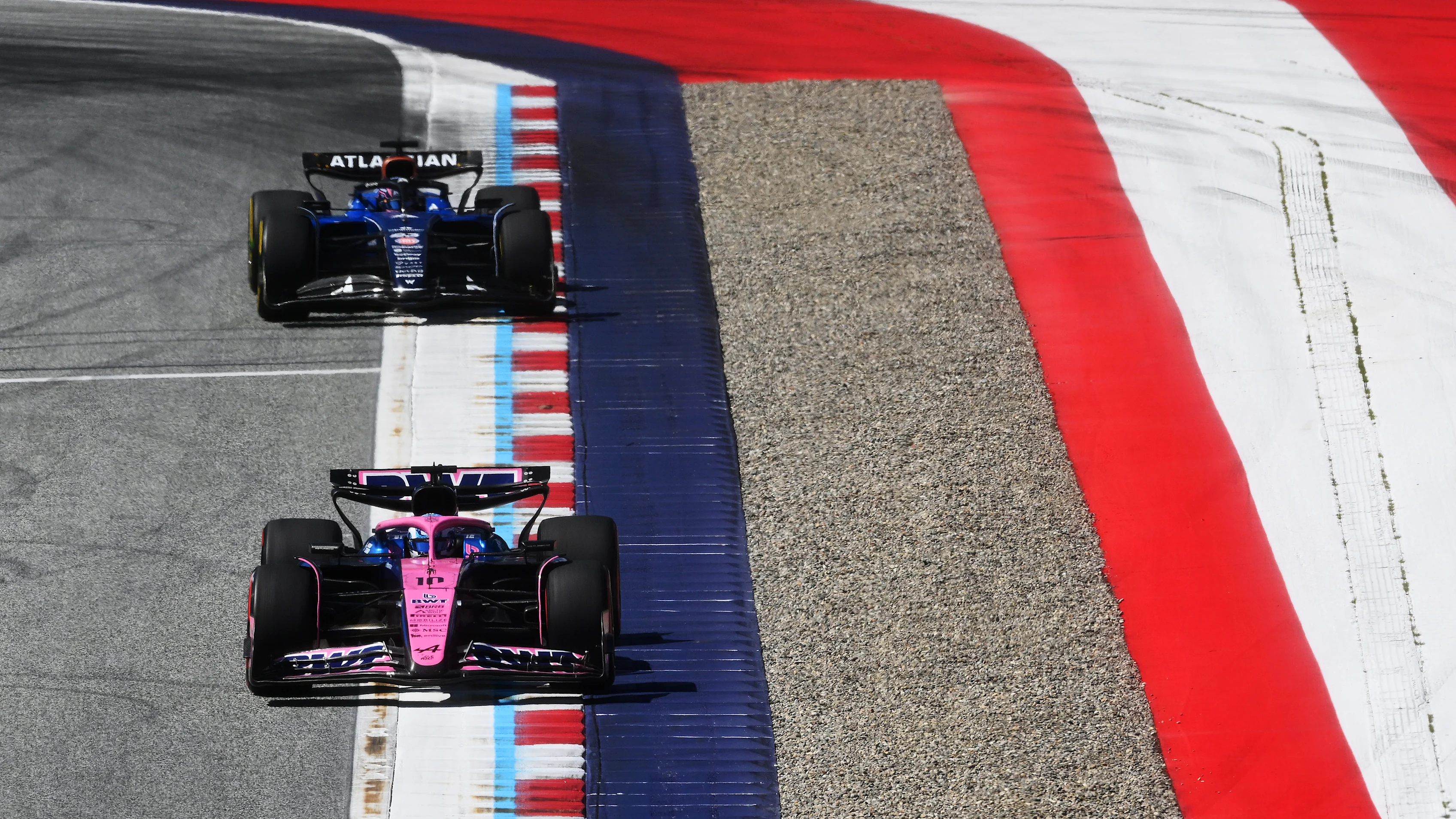 SPIELBERG, AUSTRIA - JUNE 29: Pierre Gasly of France driving the (10) Alpine F1 A525 Renault leads Alexander Albon of Thailand driving the (23) Williams FW47 Mercedes on track during the F1 Grand Prix of Austria at Red Bull Ring on June 29, 2025 in Spielberg, Austria. (Photo by Mark Sutton - Formula 1/Formula 1 via Getty Images)