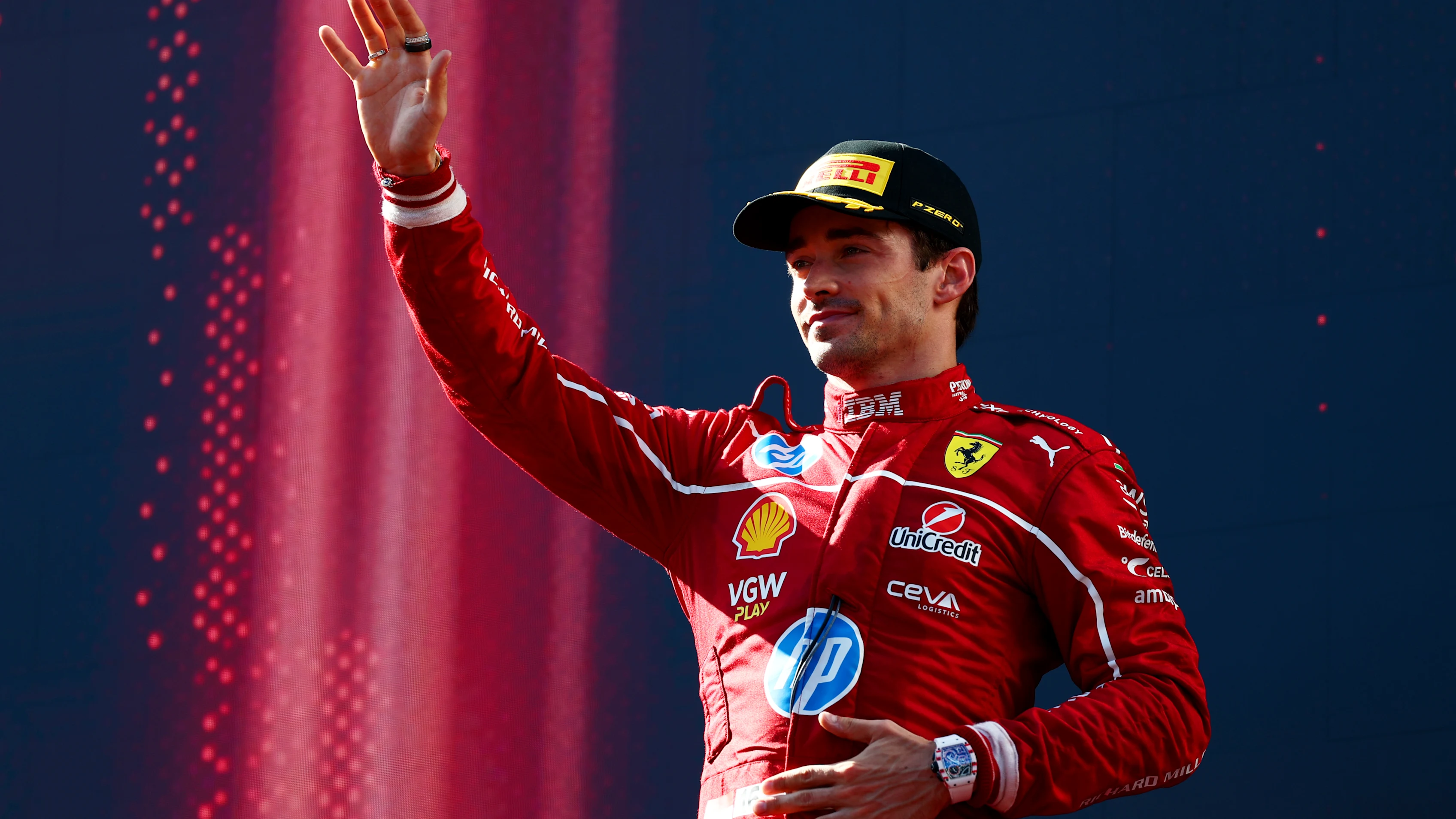 SPIELBERG, AUSTRIA - JUNE 29: Third placed Charles Leclerc of Monaco and Scuderia Ferrari waves