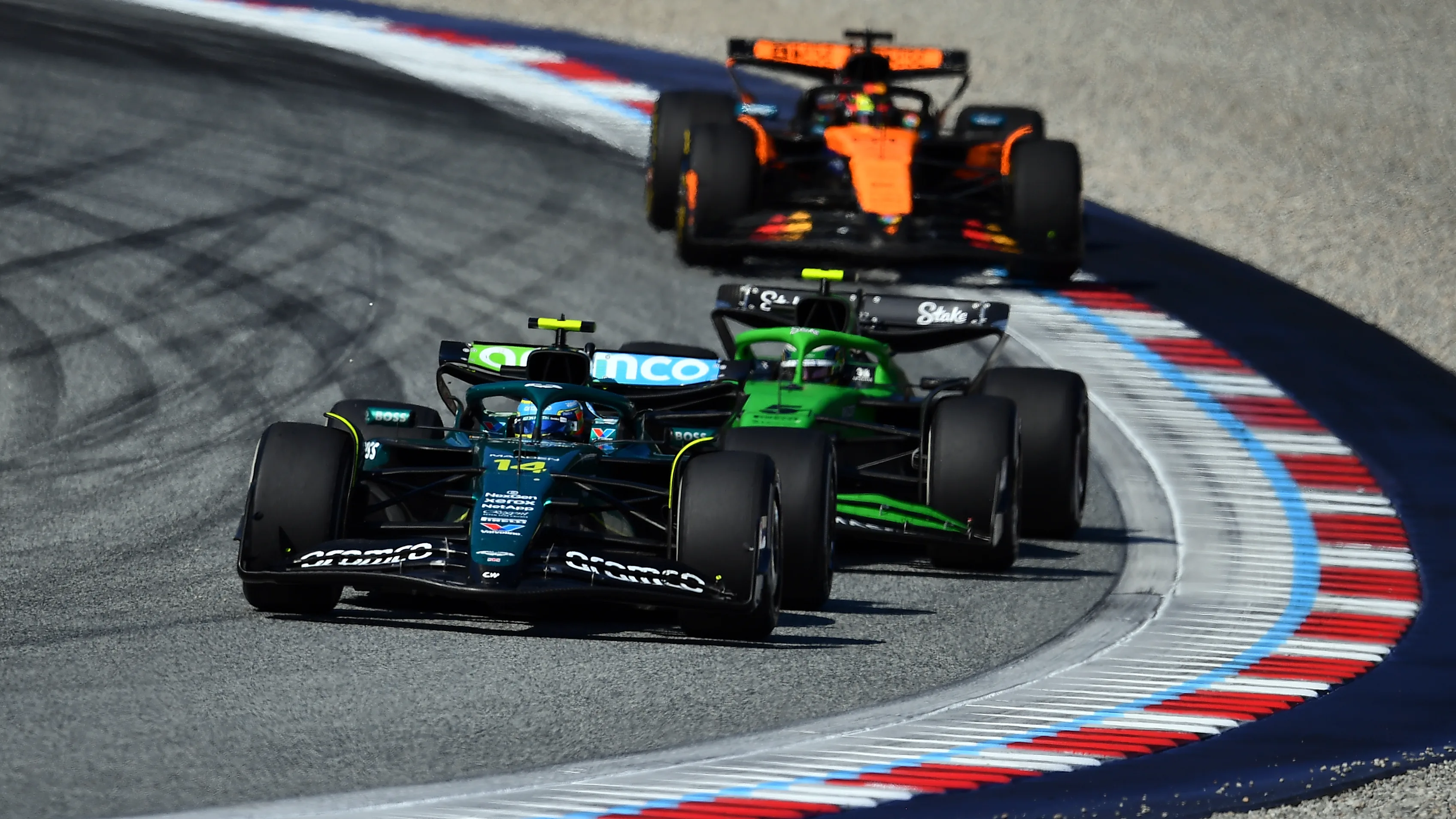 SPIELBERG, AUSTRIA - JUNE 29: Fernando Alonso of Spain driving the (14) Aston Martin F1 Team AMR25 Mercedes leads Gabriel Bortoleto of Brazil driving the (5) Kick Sauber C45 Ferrari and Oscar Piastri of Australia driving the (81) McLaren MCL39 Mercedes on track during the F1 Grand Prix of Austria at Red Bull Ring on June 29, 2025 in Spielberg, Austria. (Photo by James Sutton - Formula 1/Formula 1 via Getty Images)