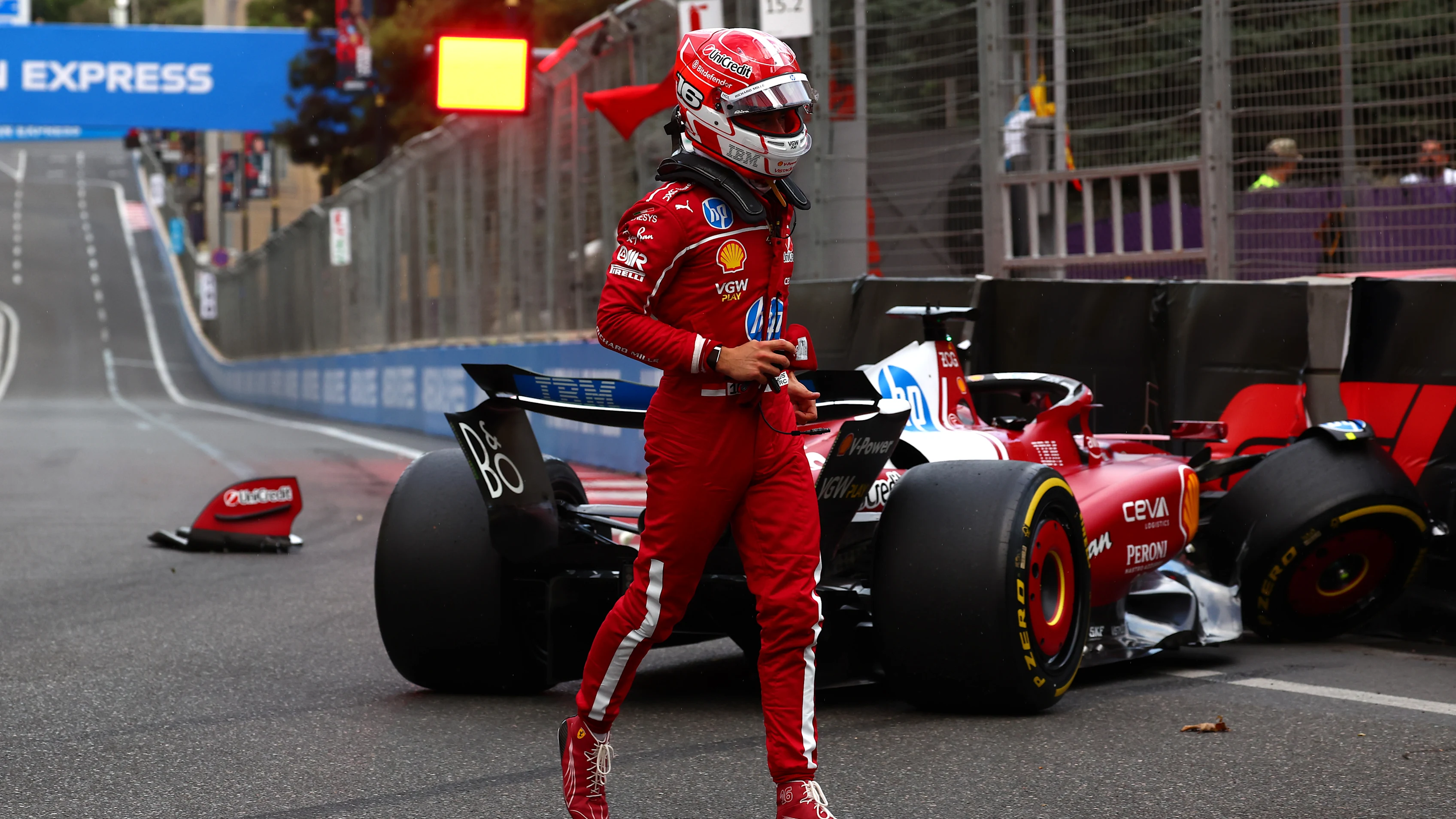 BAKU, AZERBAIJAN - SEPTEMBER 20: Charles Leclerc of Monaco and Scuderia Ferrari walks away from his