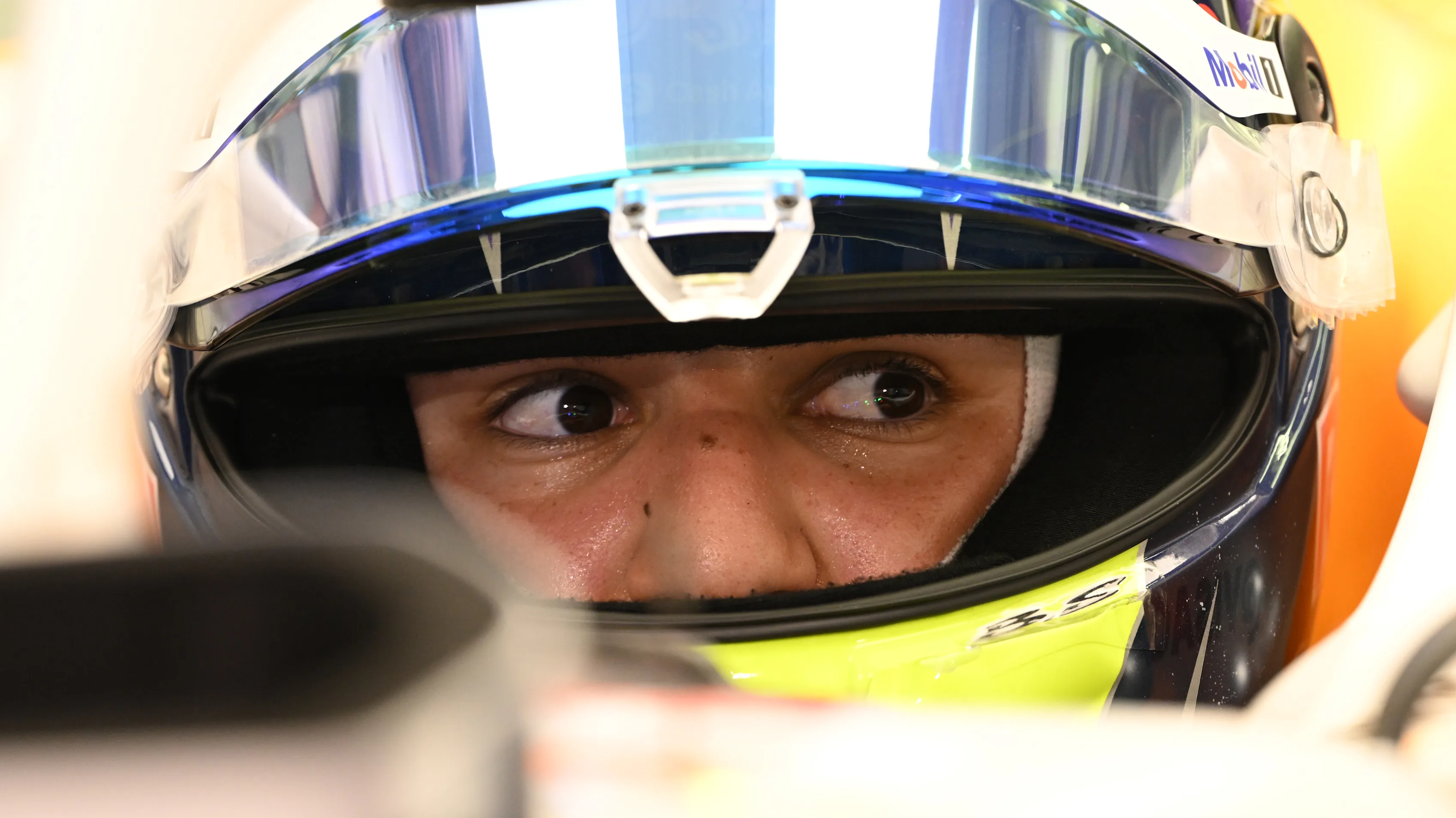 BAHRAIN, BAHRAIN - APRIL 11: Isack Hadjar of France and Visa Cash App Racing Bulls prepares to