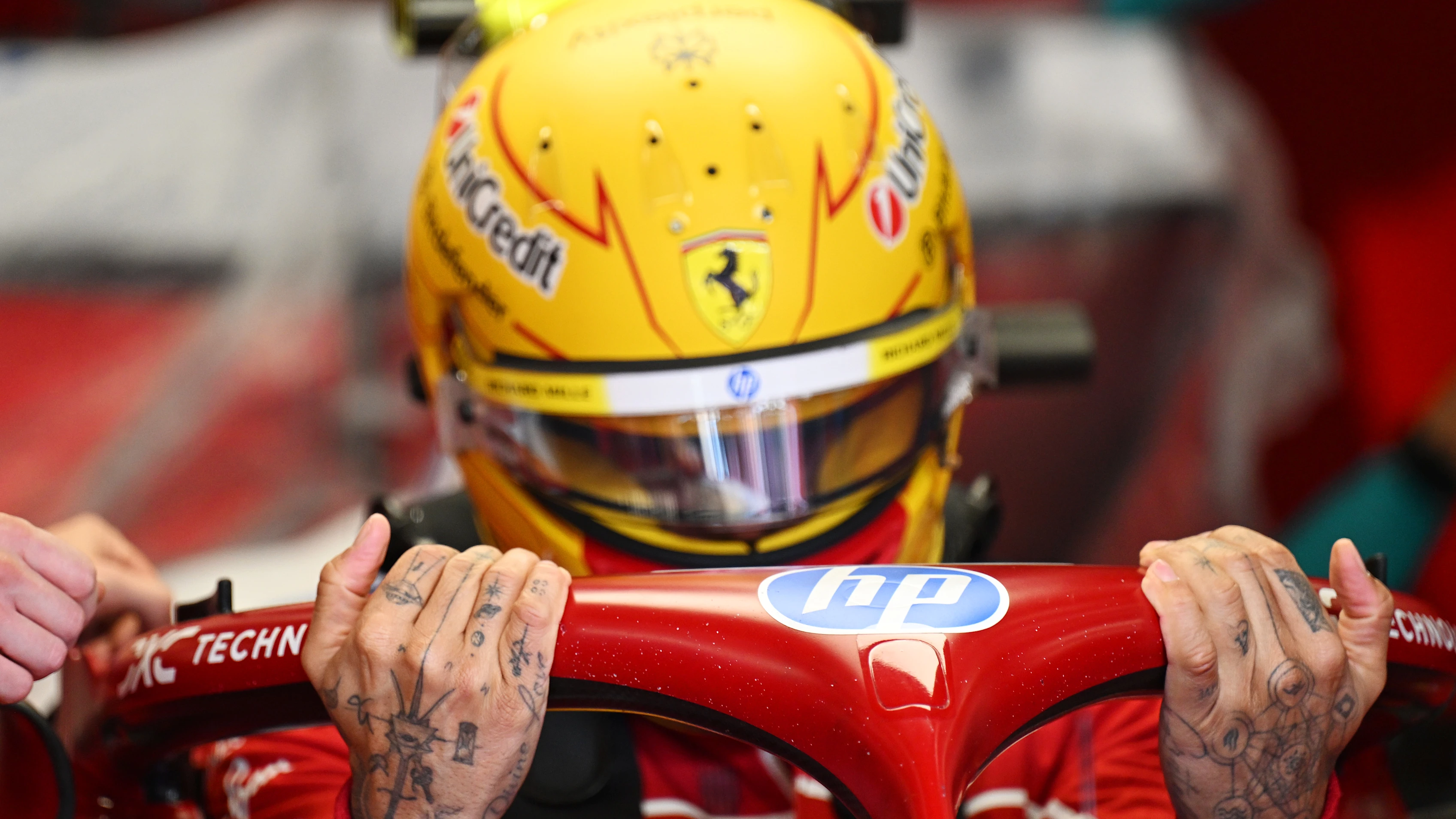 SPA, BELGIUM - JULY 25: Lewis Hamilton of Great Britain and Scuderia Ferrari prepares to drive
