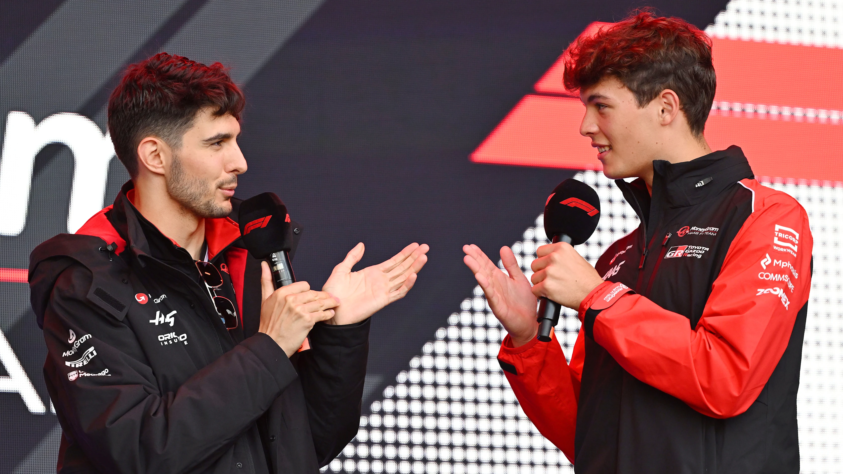 SPA, BELGIUM - JULY 26: Esteban Ocon of France and Haas F1 and Oliver Bearman of Great Britain and