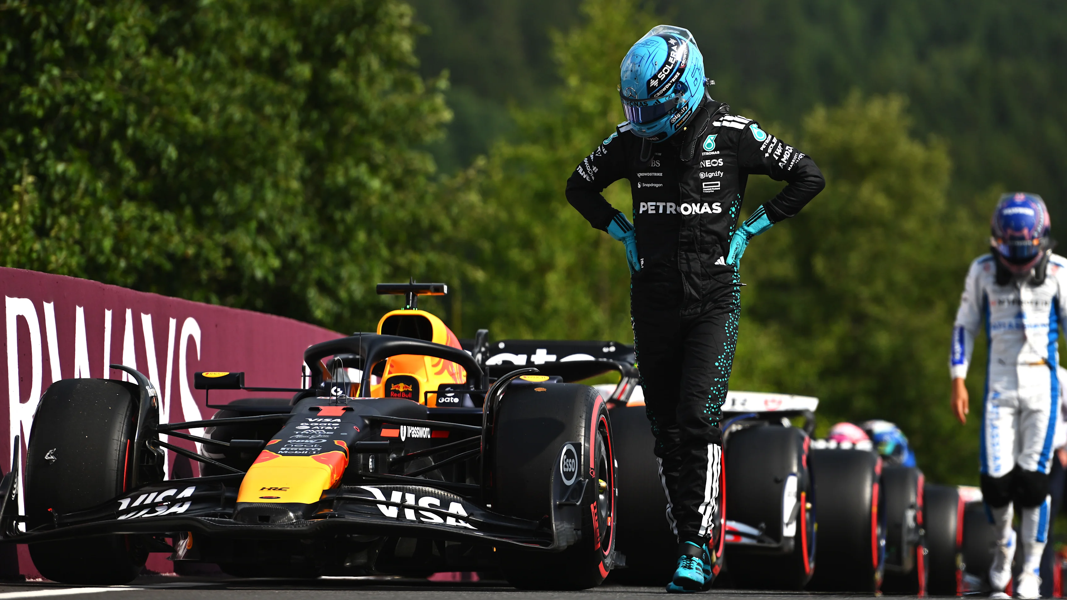 SPA, BELGIUM - JULY 26: Sixth placed qualifier George Russell of Great Britain and Mercedes AMG Petronas F1 Team looks on in parc ferme during qualifying ahead of the F1 Grand Prix of Belgium at Circuit de Spa-Francorchamps on July 26, 2025 in Spa, Belgium. (Photo by Rudy Carezzevoli/Getty Images)
