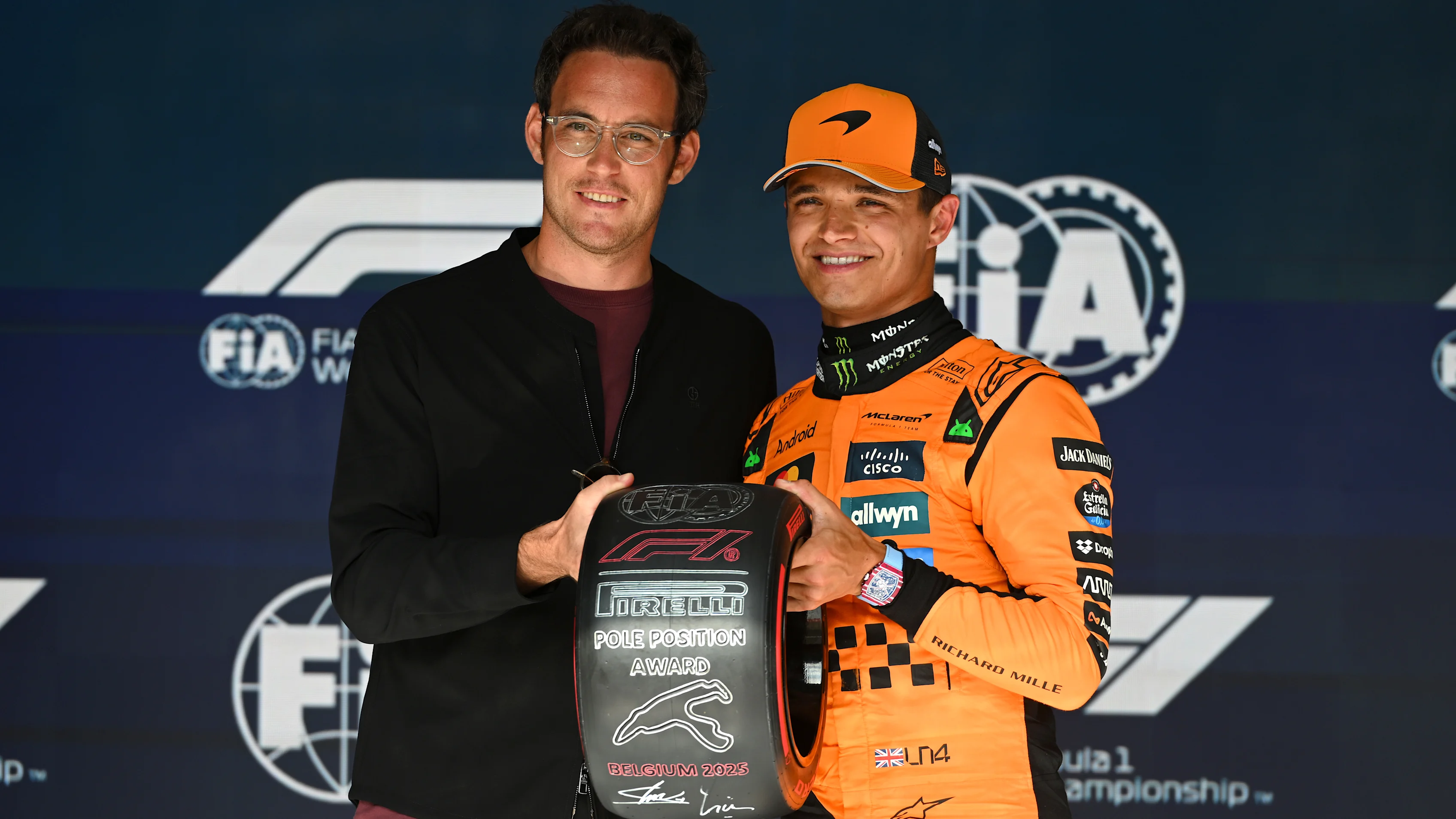SPA, BELGIUM - JULY 26: Thierry Neuville presents Pole position qualifier Lando Norris of Great