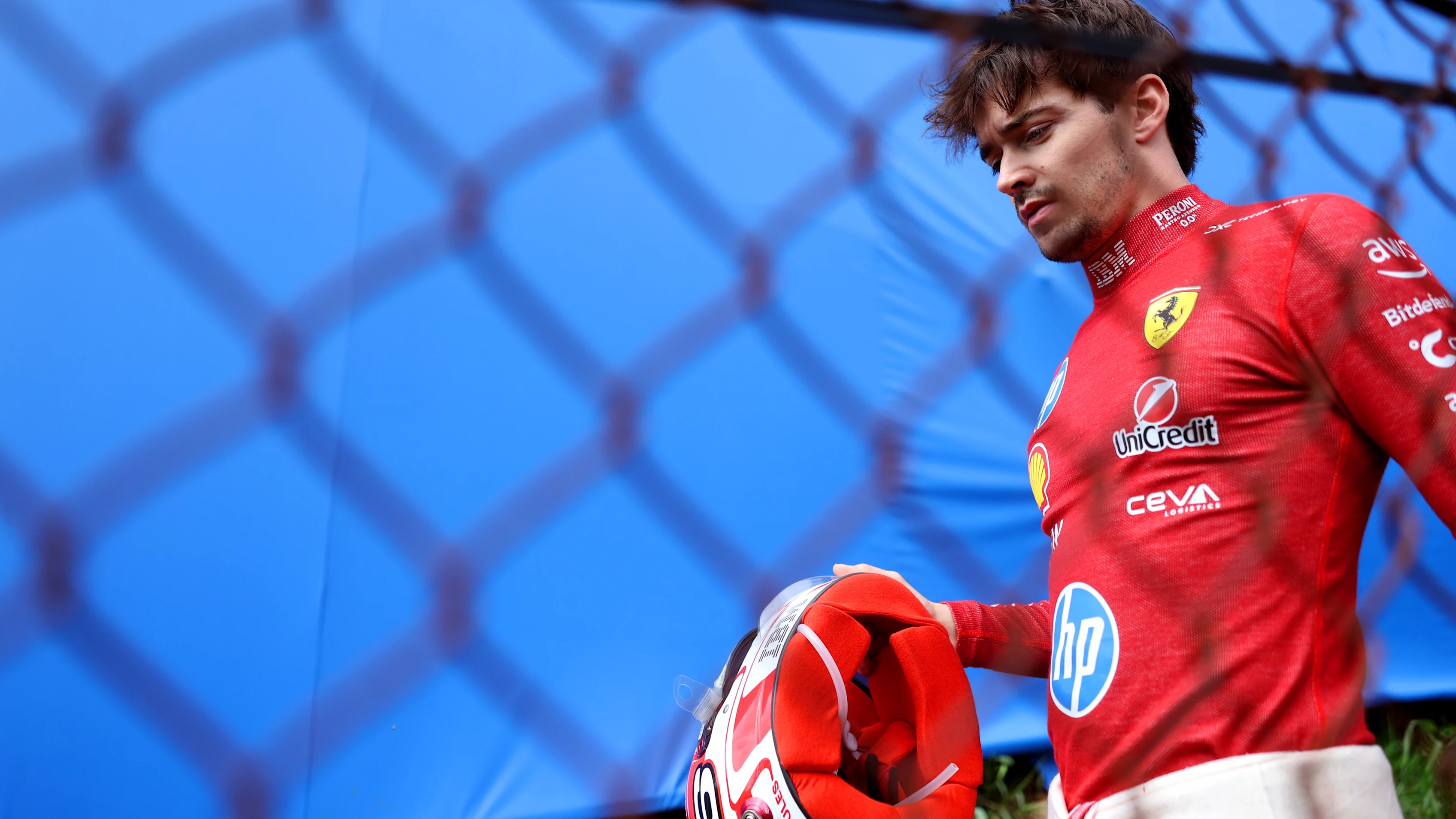 SAO PAULO, BRAZIL - NOVEMBER 09: Charles Leclerc of Monaco and Scuderia Ferrari walks away after