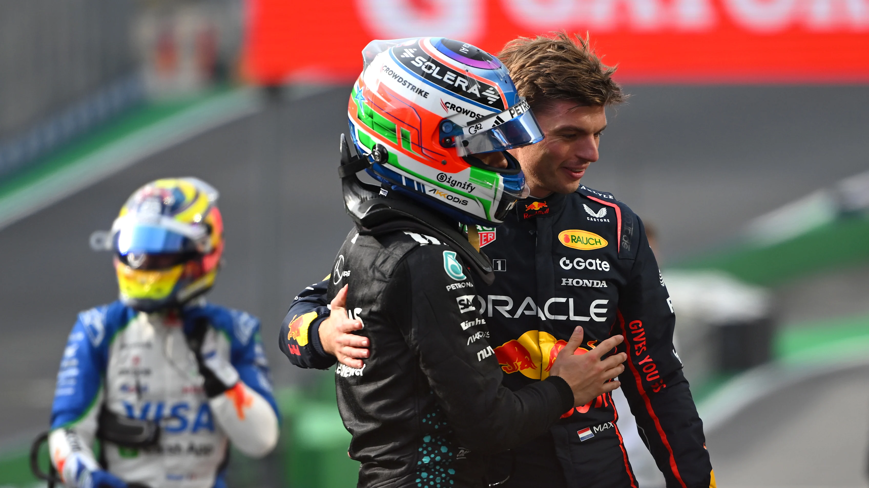 SAO PAULO, BRAZIL - NOVEMBER 07: Sprint 2nd qualifier Andrea Kimi Antonelli of Italy and Mercedes AMG Petronas F1 Team is congratulated by Max Verstappen of the Netherlands and Oracle Red Bull Racing in parc ferme during Sprint Qualifying ahead of the F1 Grand Prix of Brazil at Autodromo Jose Carlos Pace on November 07, 2025 in Sao Paulo, Brazil. (Photo by Rudy Carezzevoli/Getty Images)