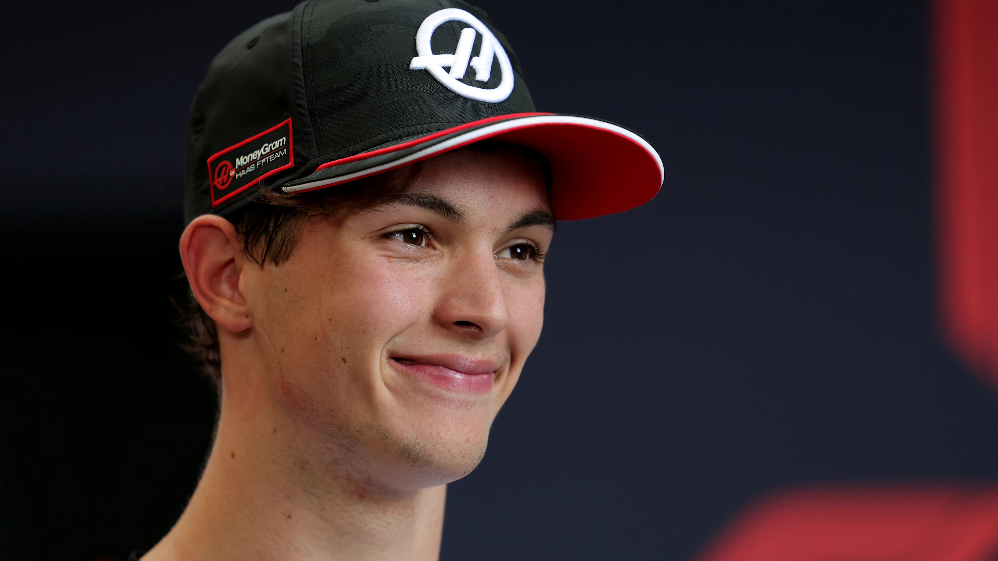 SAO PAULO, BRAZIL - NOVEMBER 08: Eighth placed qualifier Oliver Bearman of Great Britain and Haas F1 is interviewed during qualifying ahead of the F1 Grand Prix of Brazil at Autodromo Jose Carlos Pace on November 08, 2025 in Sao Paulo, Brazil. (Photo by Anni Graf - Formula 1/Formula 1 via Getty Images)