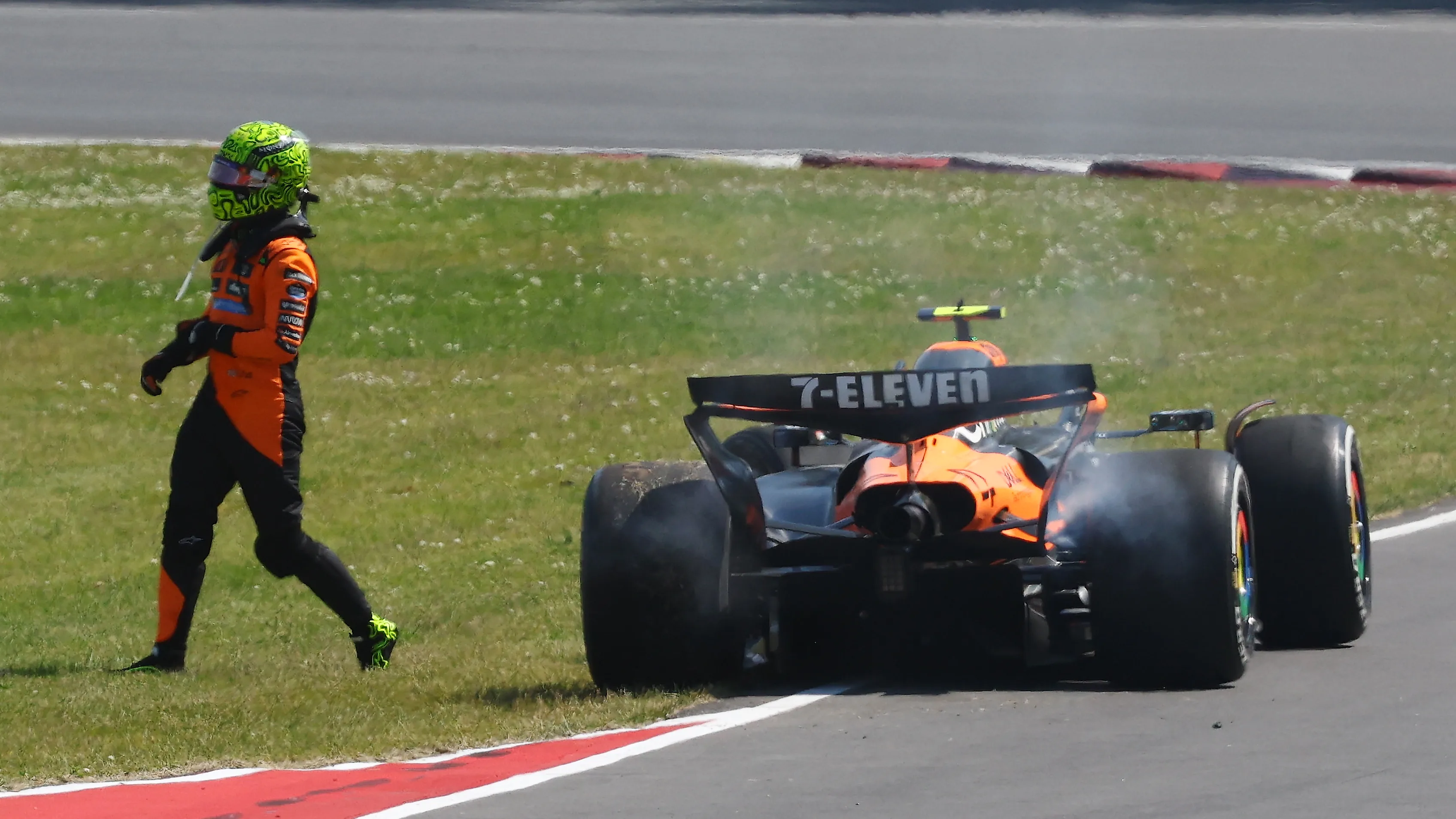 MONTREAL, QUEBEC - JUNE 15: Lando Norris of Great Britain and McLaren walks away from his damaged