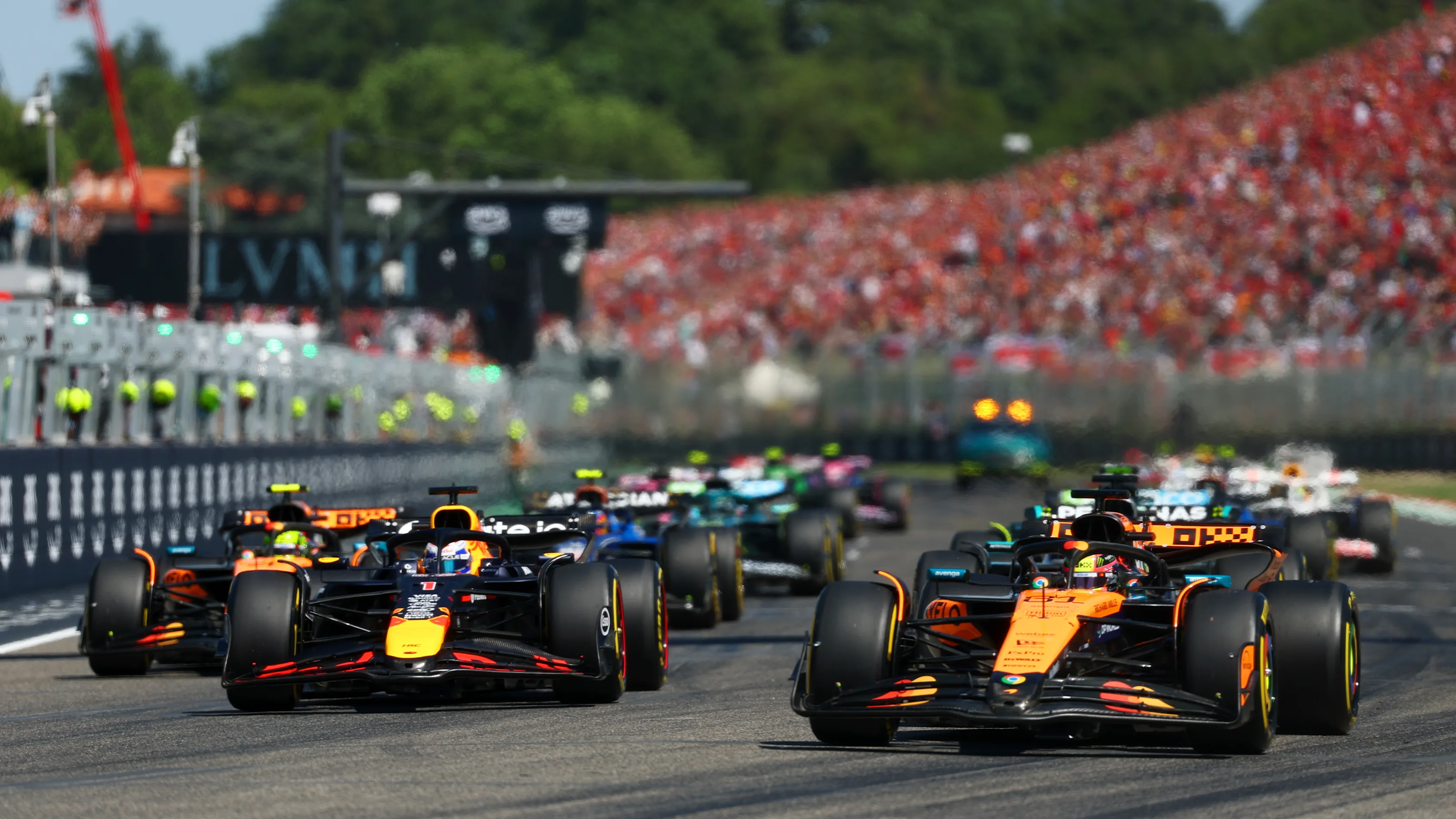 IMOLA, ITALY - MAY 18: Oscar Piastri of Australia driving the (81) McLaren MCL39 Mercedes leads Max